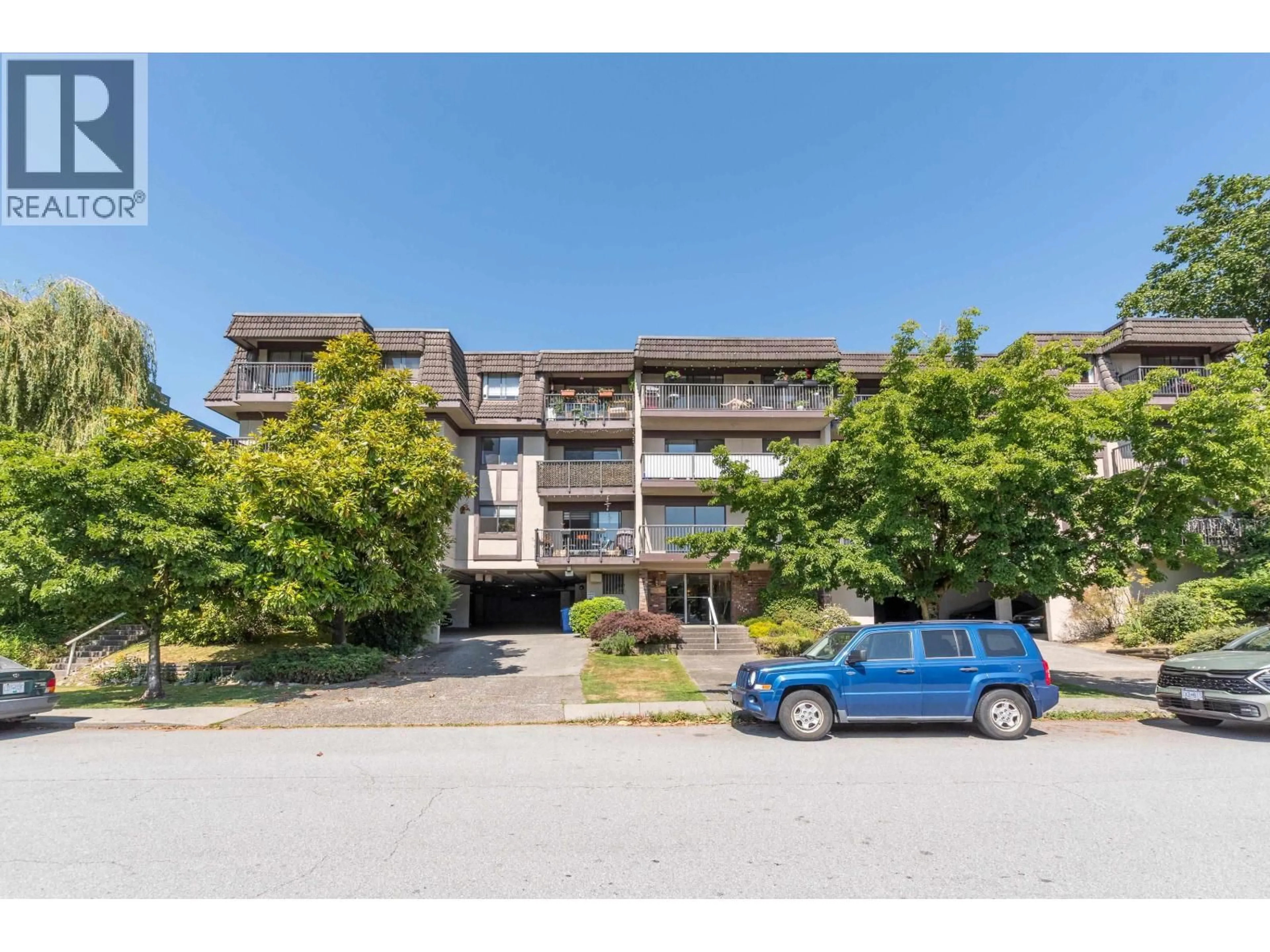 A pic from outside/outdoor area/front of a property/back of a property/a pic from drone, street for 104 - 252 2ND STREET, North Vancouver British Columbia V7M1C8