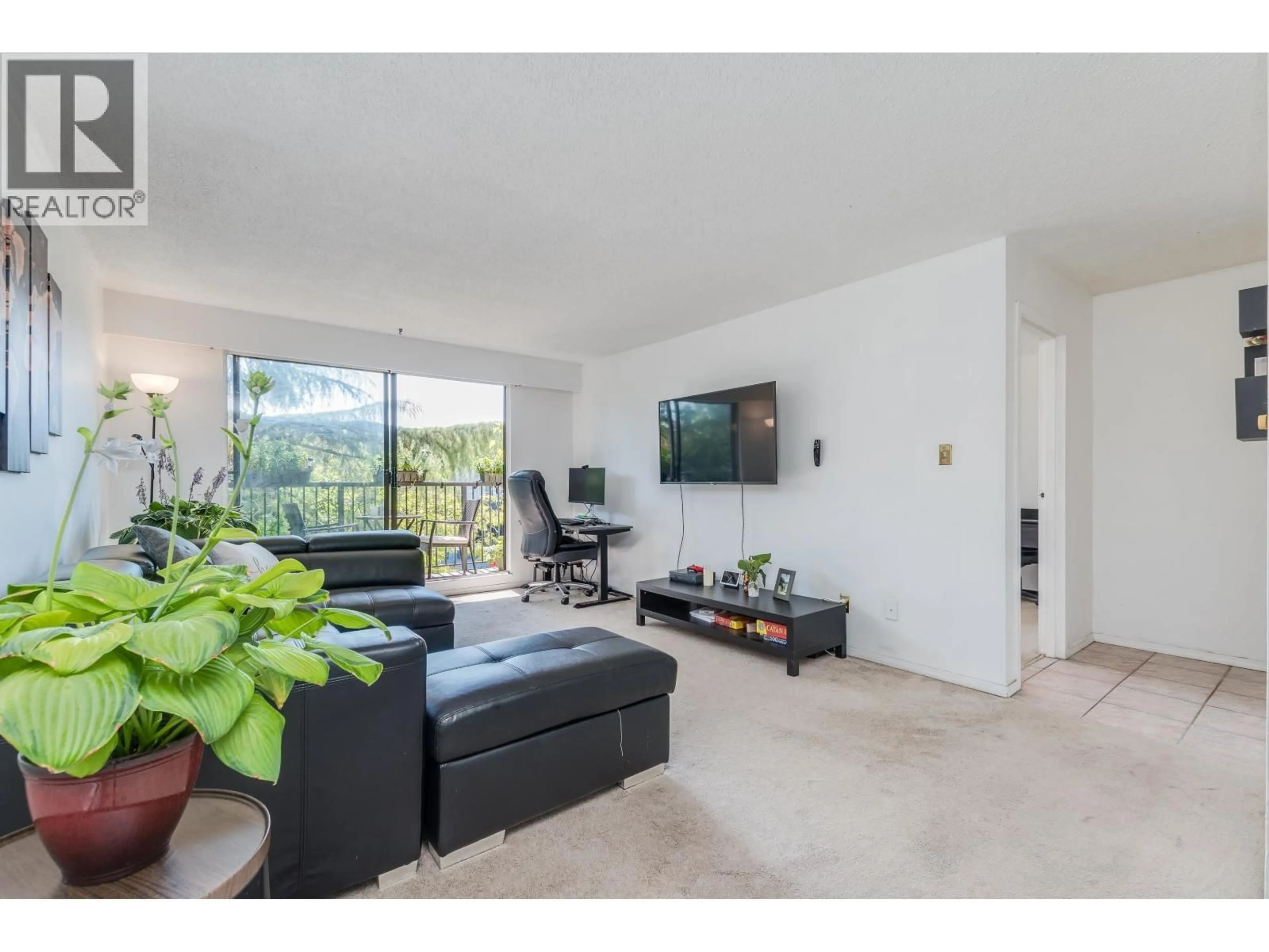 Living room with furniture, unknown for 104 - 252 2ND STREET, North Vancouver British Columbia V7M1C8