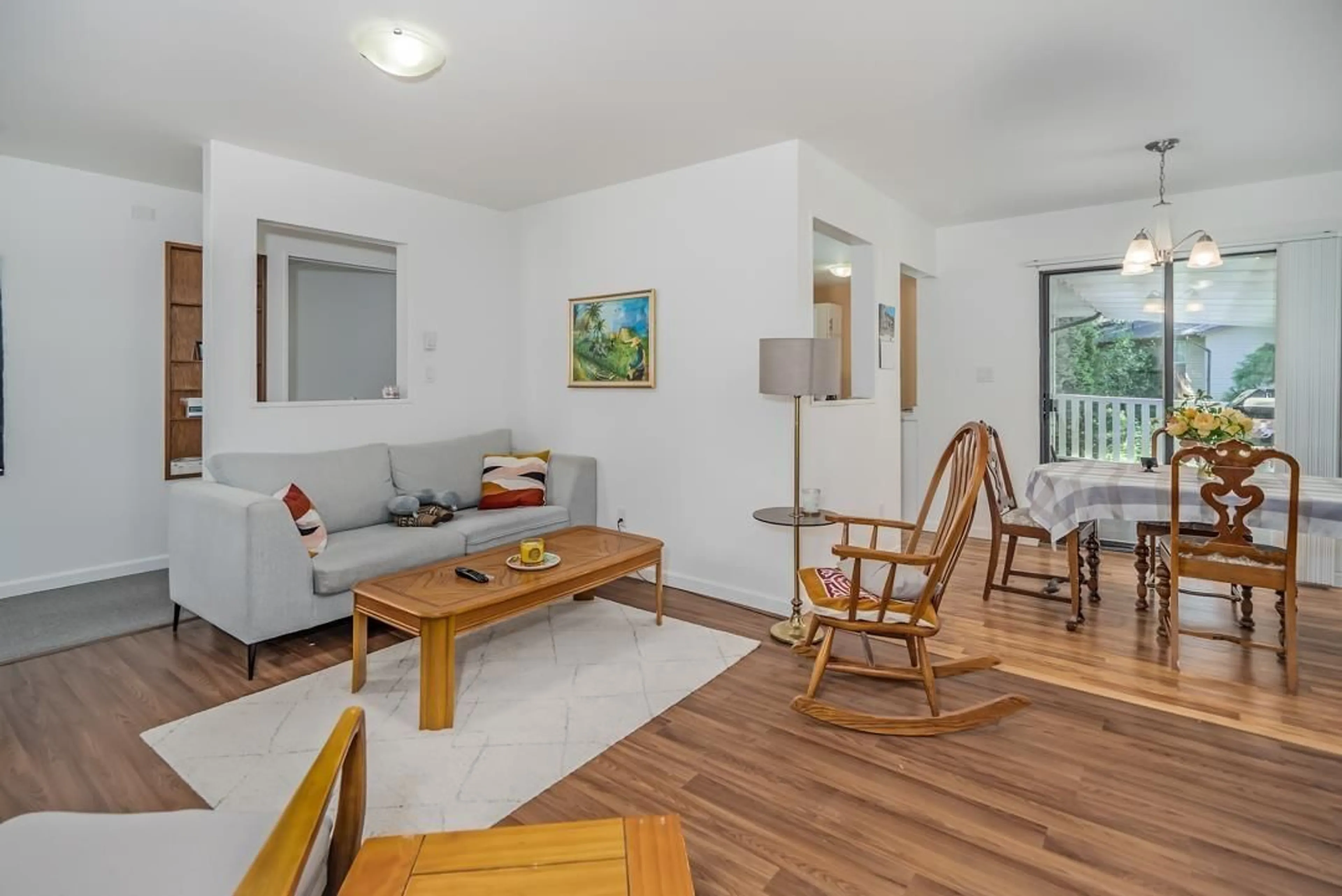 Living room with furniture, wood/laminate floor for 35340 SELKIRK, Abbotsford British Columbia V2S8L2