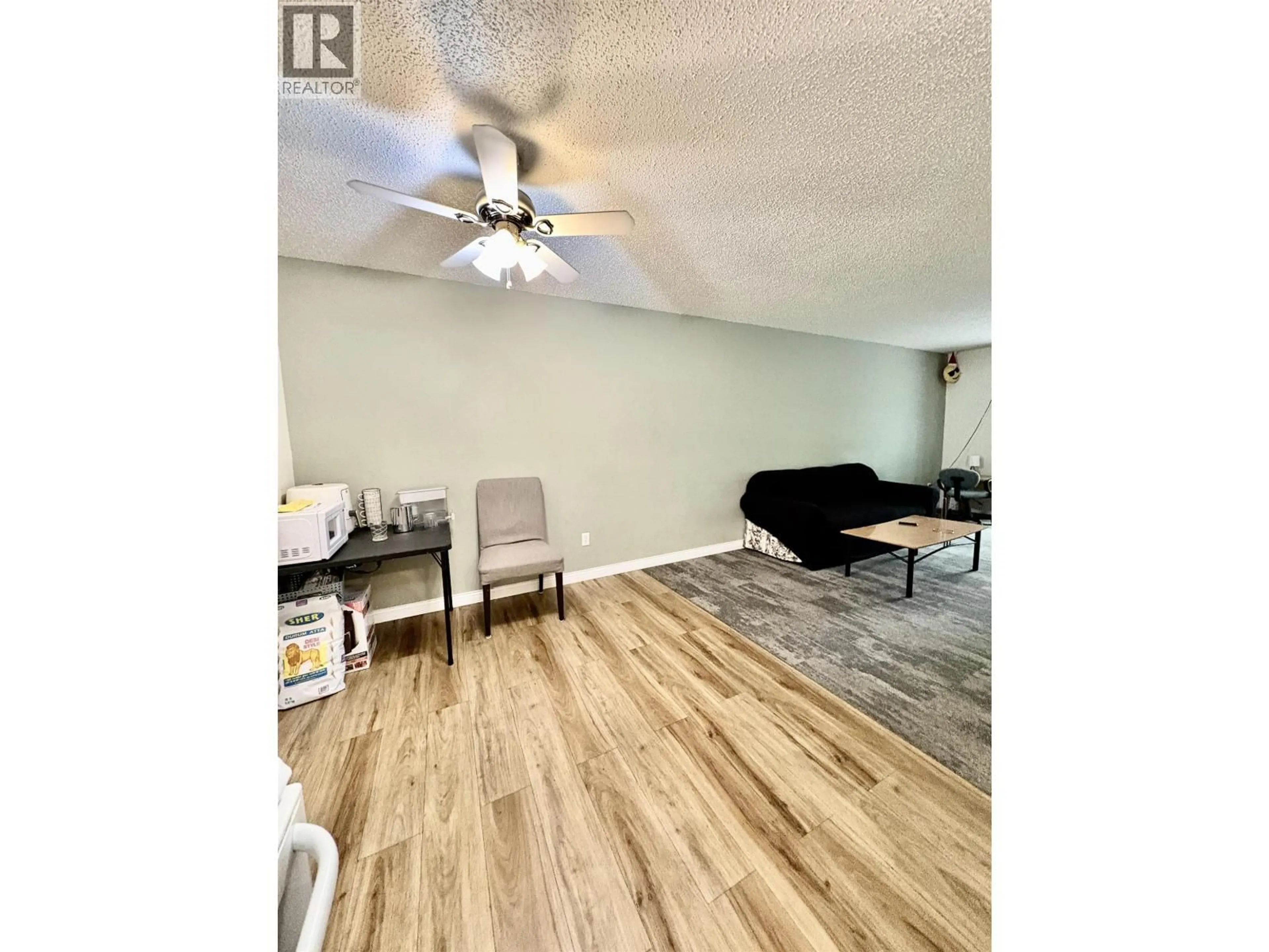 Living room with furniture, wood/laminate floor for 1206 - 2607 PEAR STREET, Terrace British Columbia V8G4V5