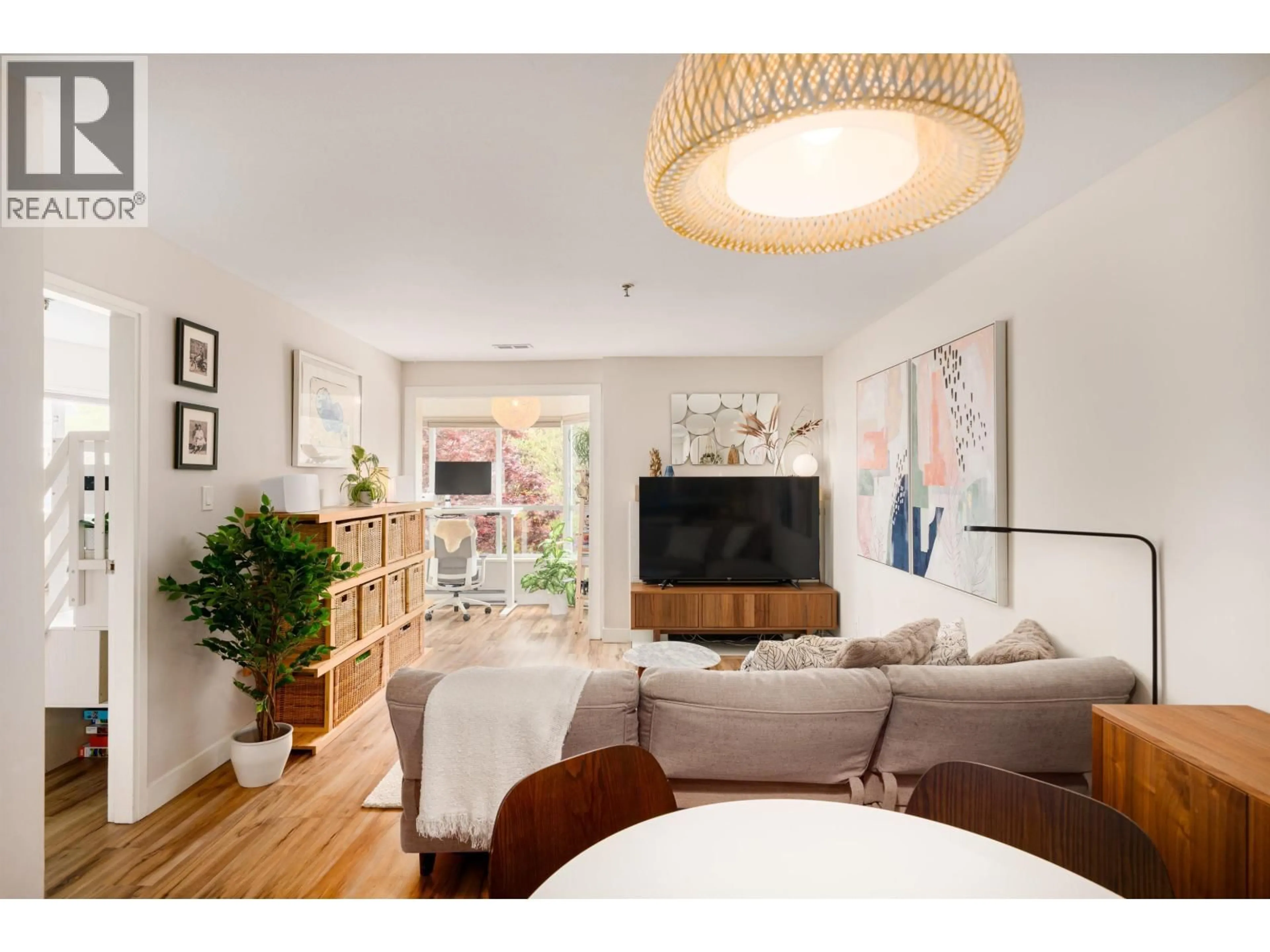 Living room with furniture, wood/laminate floor for 302 - 2333 ETON STREET, Vancouver British Columbia V5L1E2
