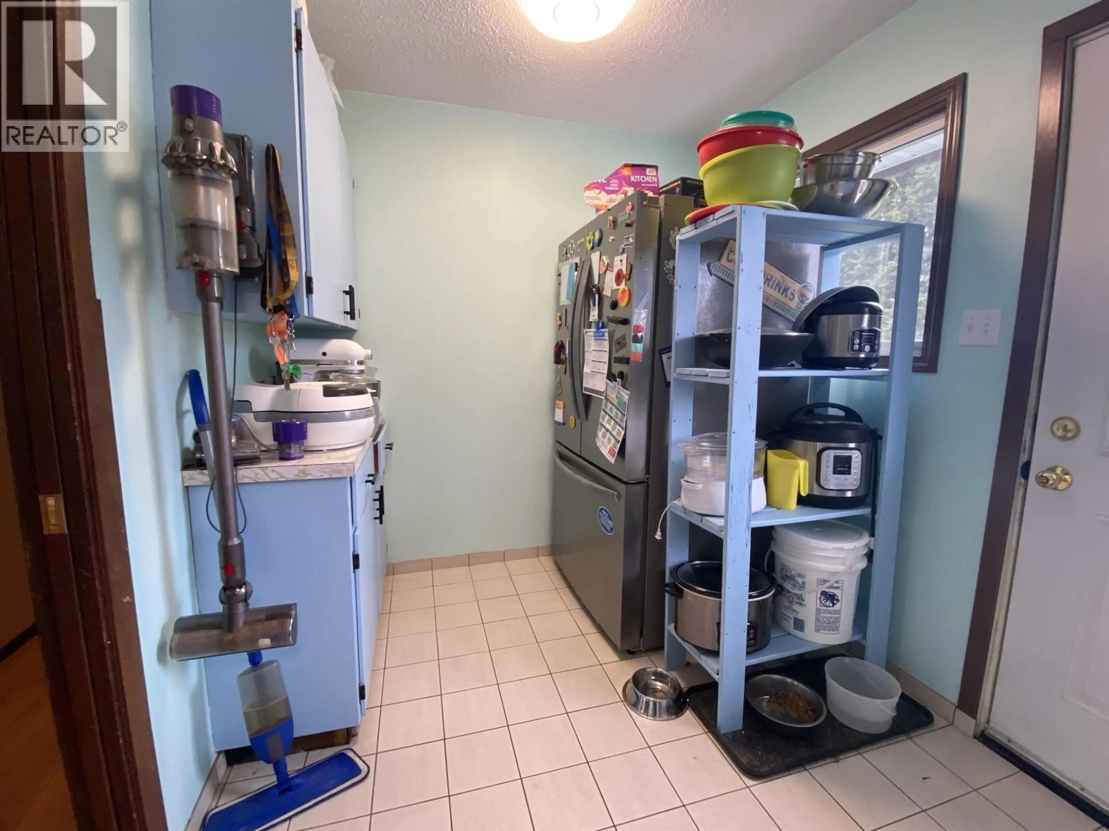 Kitchen with laundary machines, floor is not visible for 4710 GAIR AVENUE, Terrace British Columbia V8G2J9
