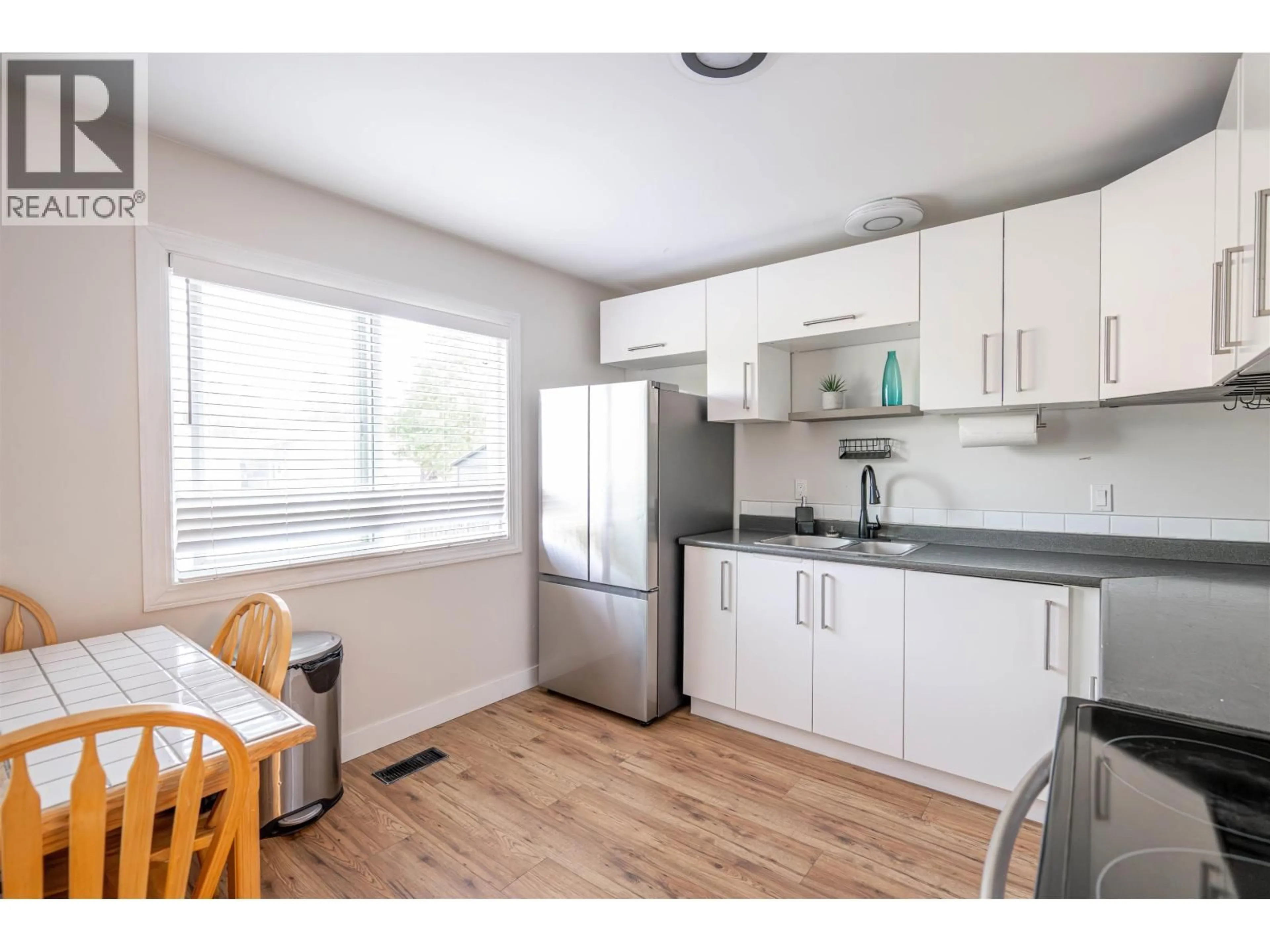 Standard kitchen, wood/laminate floor for 4242 NESS AVENUE, Prince George British Columbia V2M5B2