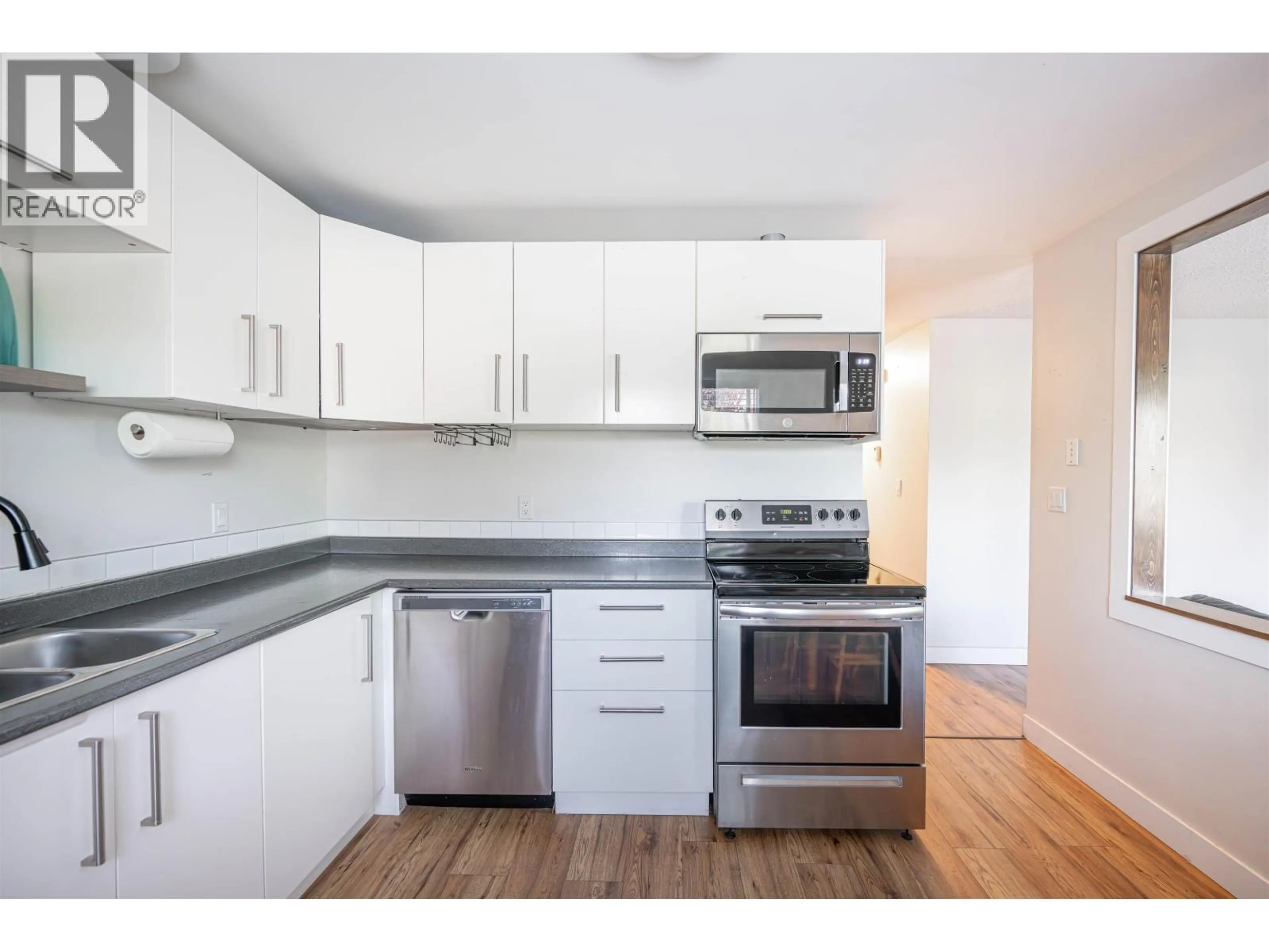 Standard kitchen, wood/laminate floor for 4242 NESS AVENUE, Prince George British Columbia V2M5B2