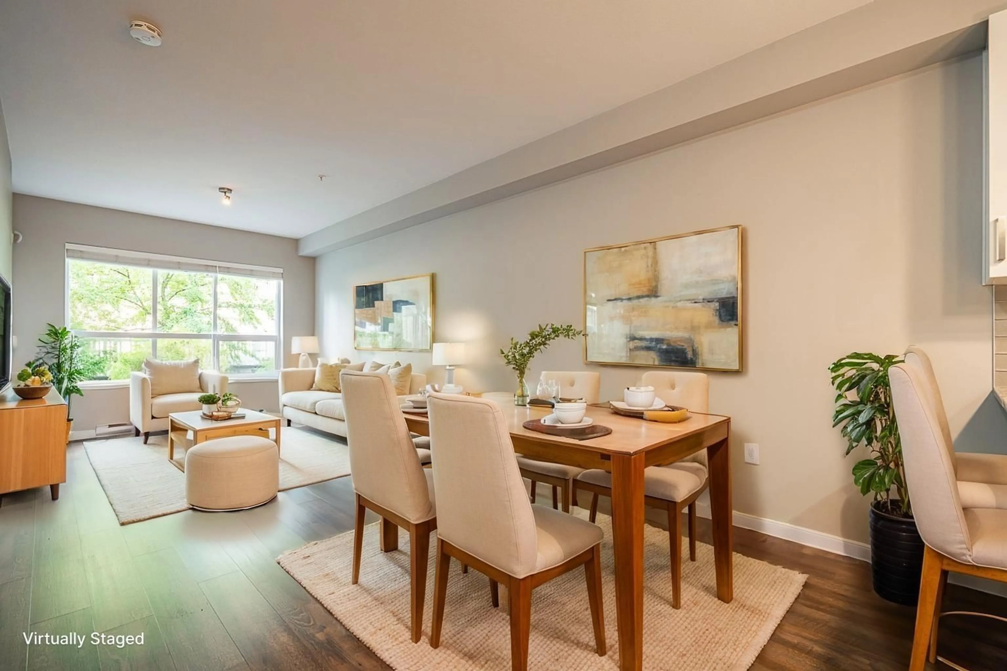 Living room with furniture, wood/laminate floor for 210 - 6470 194, Surrey British Columbia V4N6J9
