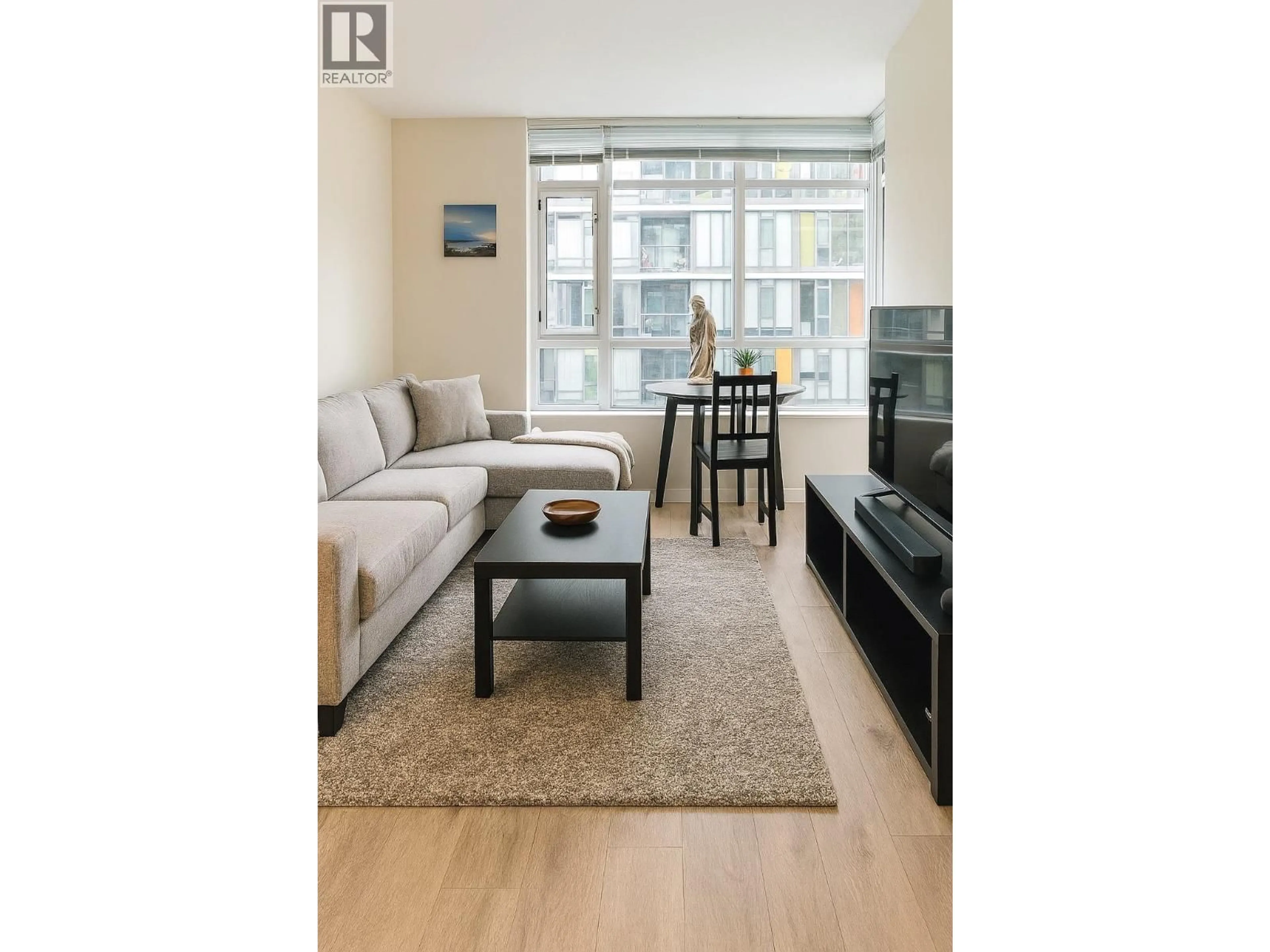 Living room with furniture, wood/laminate floor for 604 - 89 2ND AVENUE, Vancouver British Columbia V5Y0G9