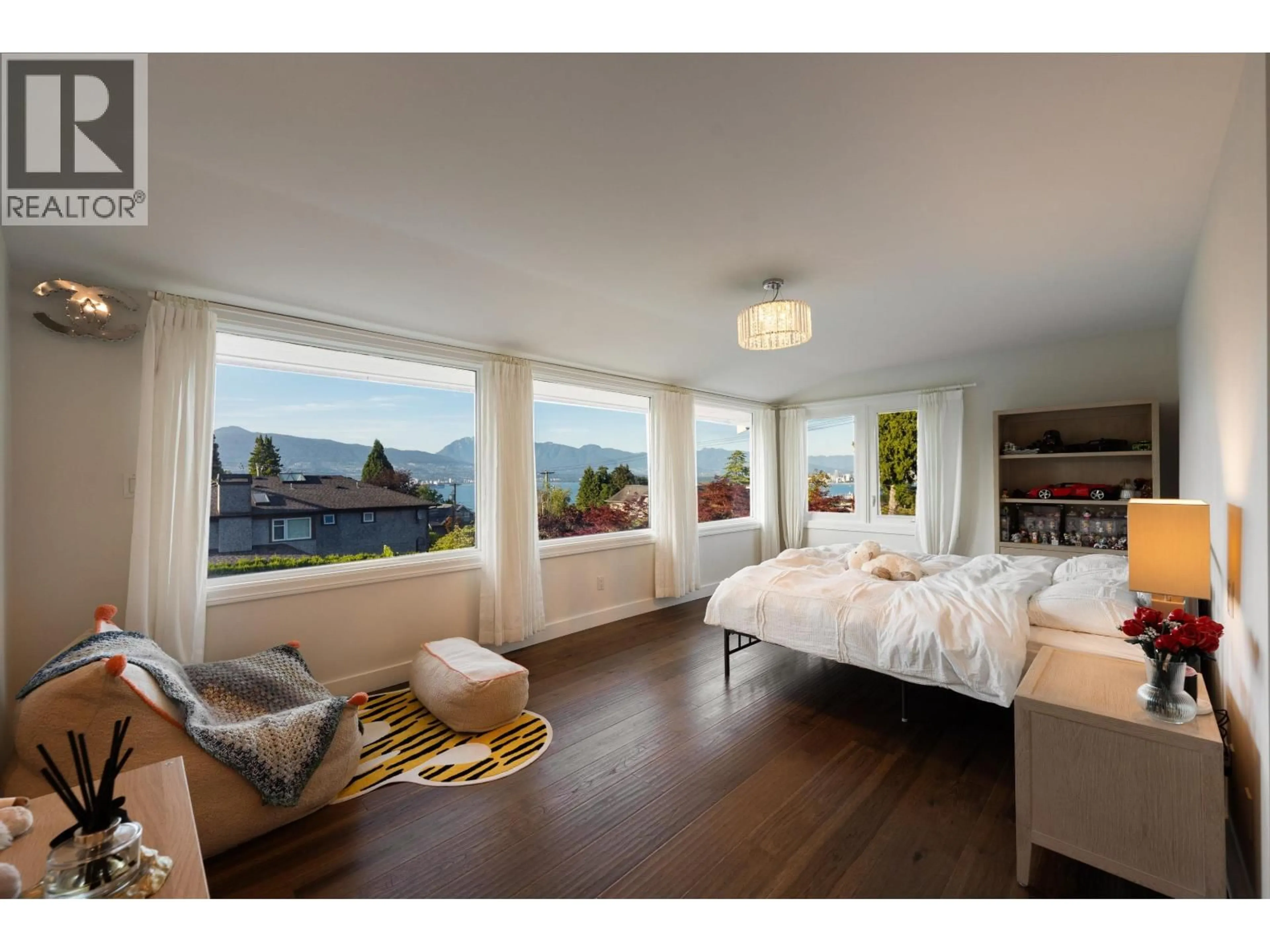 Bedroom with bed, wood/laminate floor for 4603 5TH AVENUE, Vancouver British Columbia V6R1S9