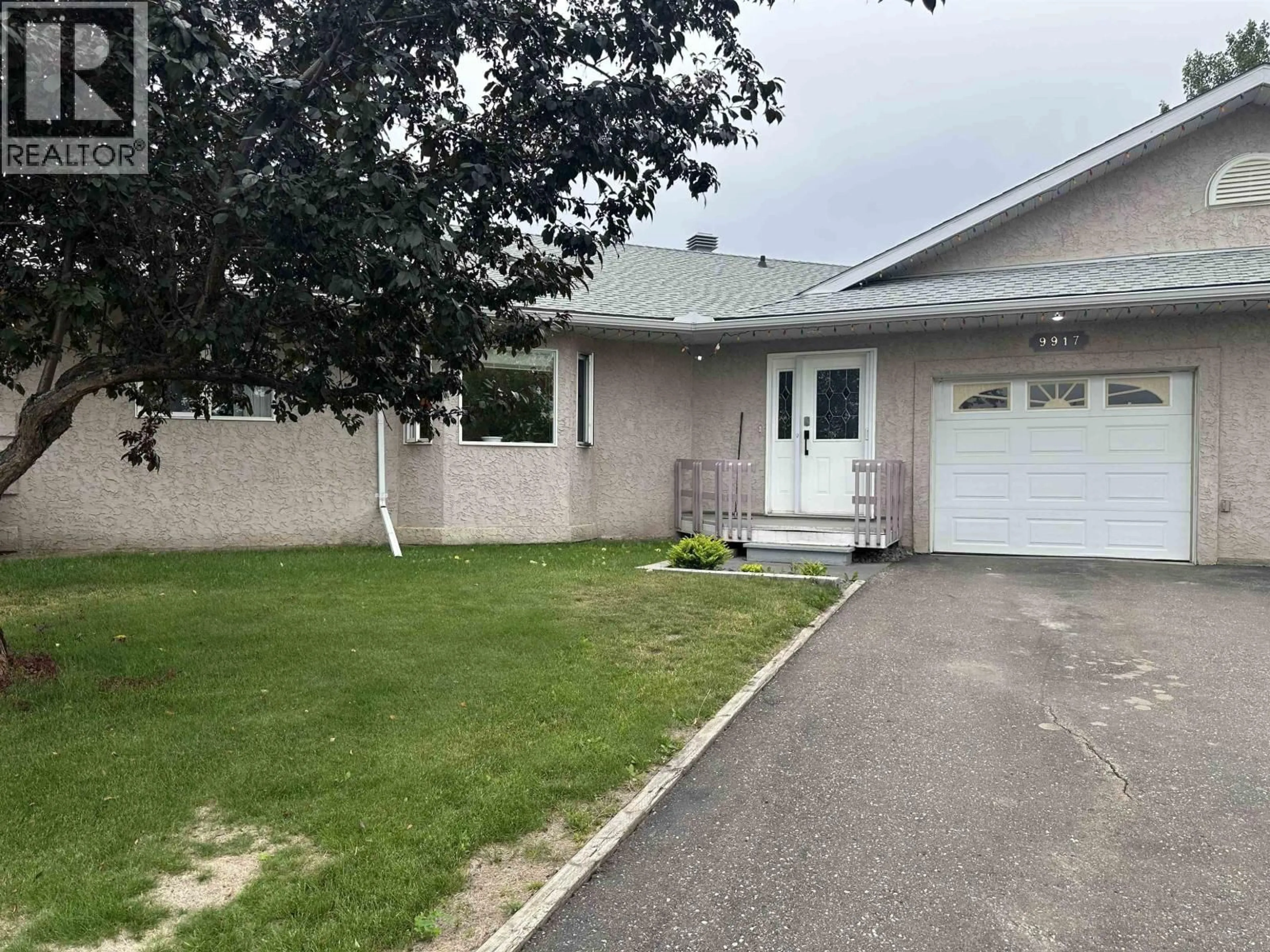 Home with vinyl exterior material, street for 9917 115 AVENUE, Fort St. John British Columbia V1J6R8