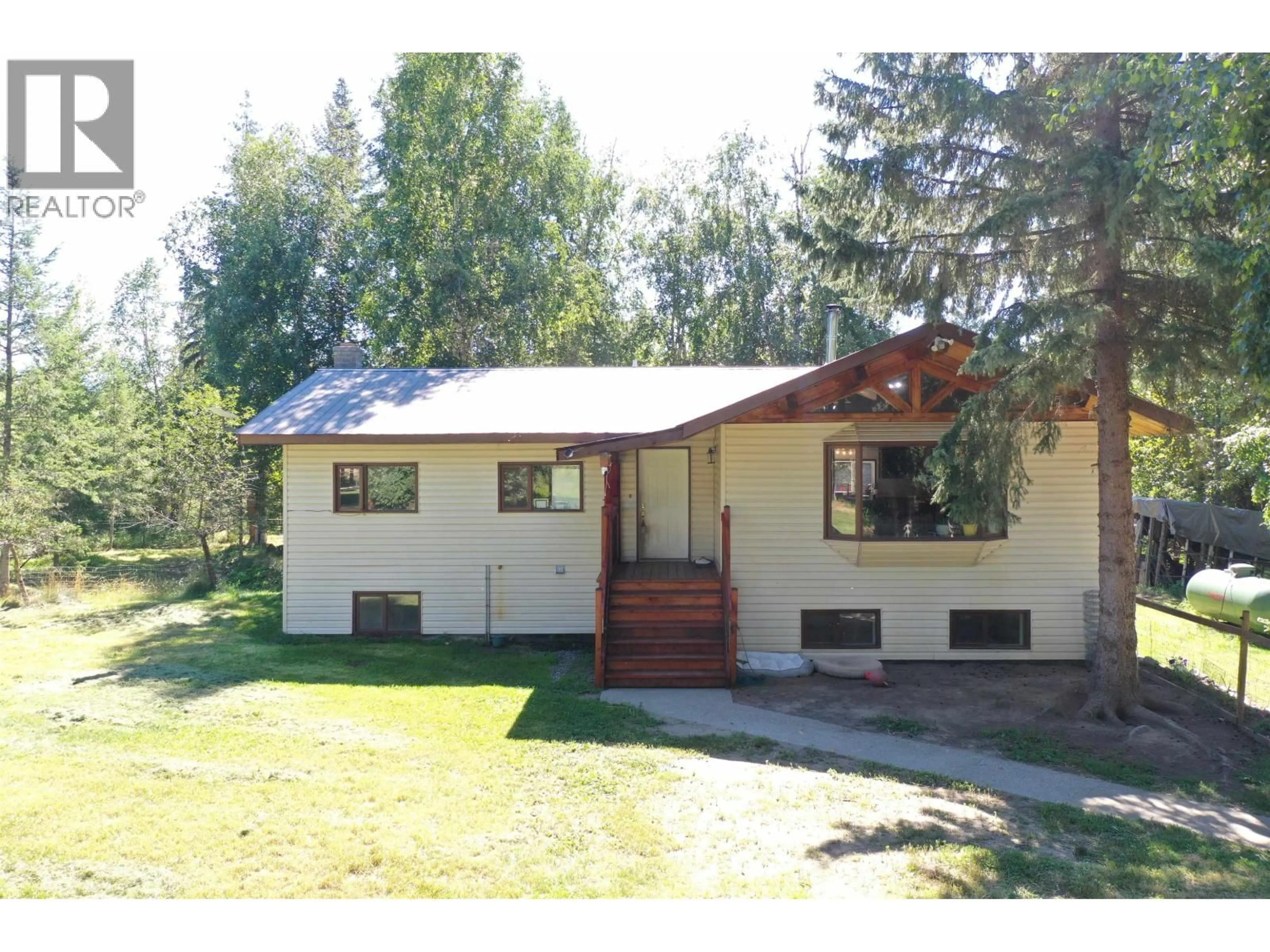 Home with vinyl exterior material, street for 2341 REIERSON ROAD, Quesnel British Columbia V2J6K1