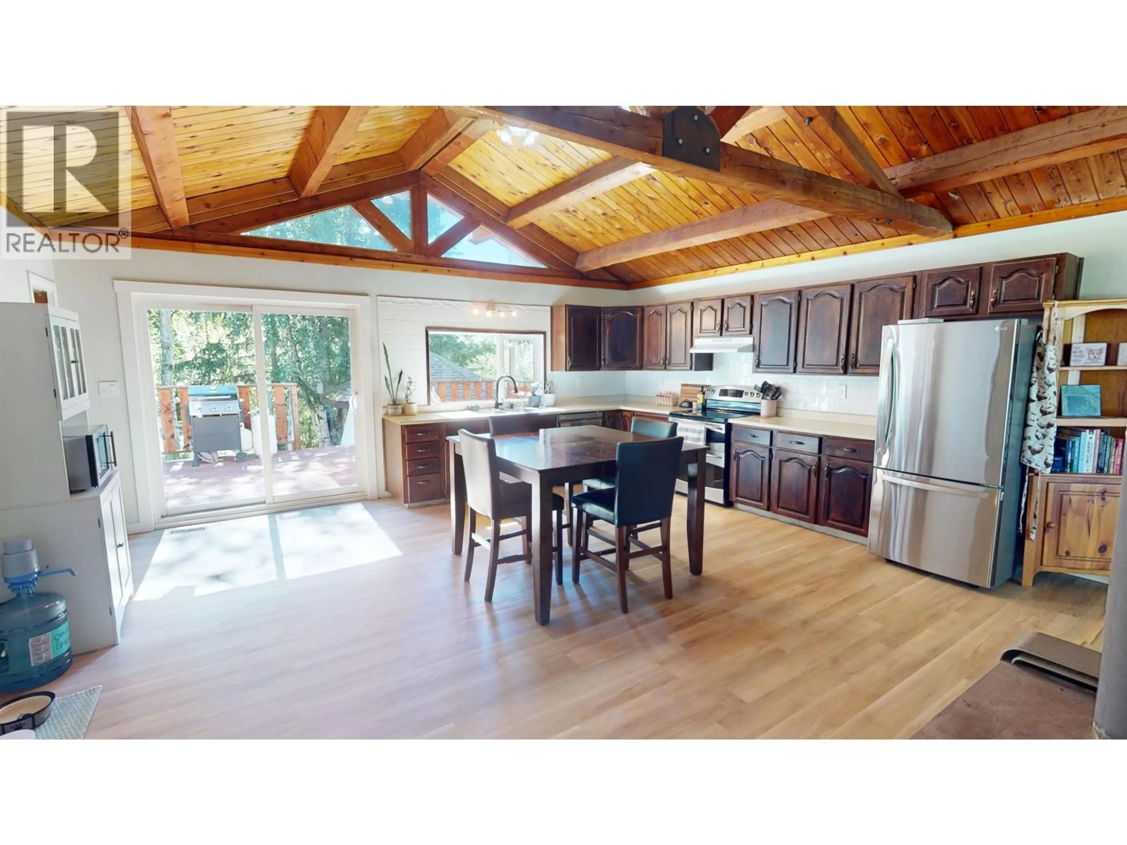 Open concept kitchen, wood/laminate floor for 2341 REIERSON ROAD, Quesnel British Columbia V2J6K1