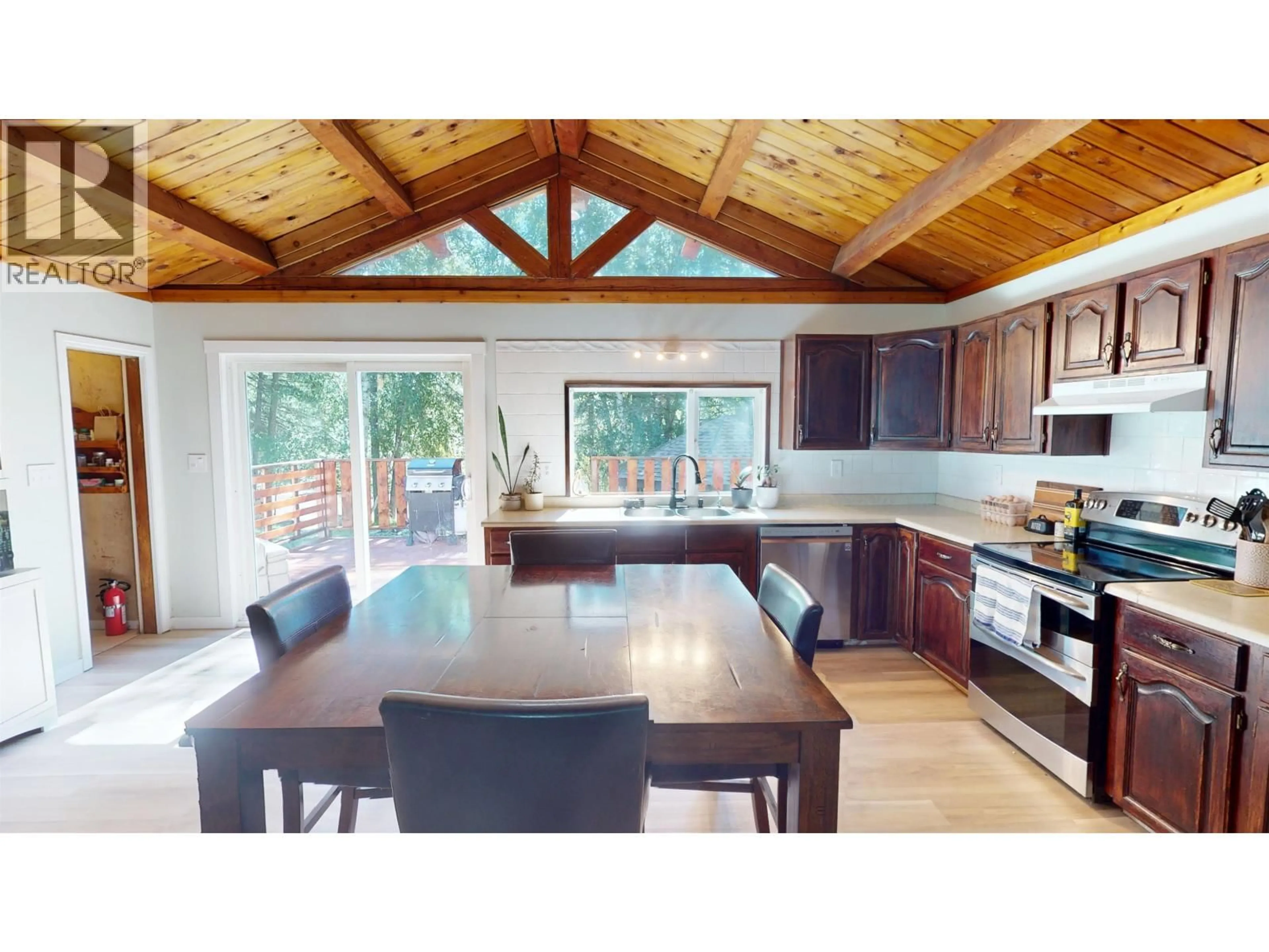 Open concept kitchen, wood/laminate floor for 2341 REIERSON ROAD, Quesnel British Columbia V2J6K1