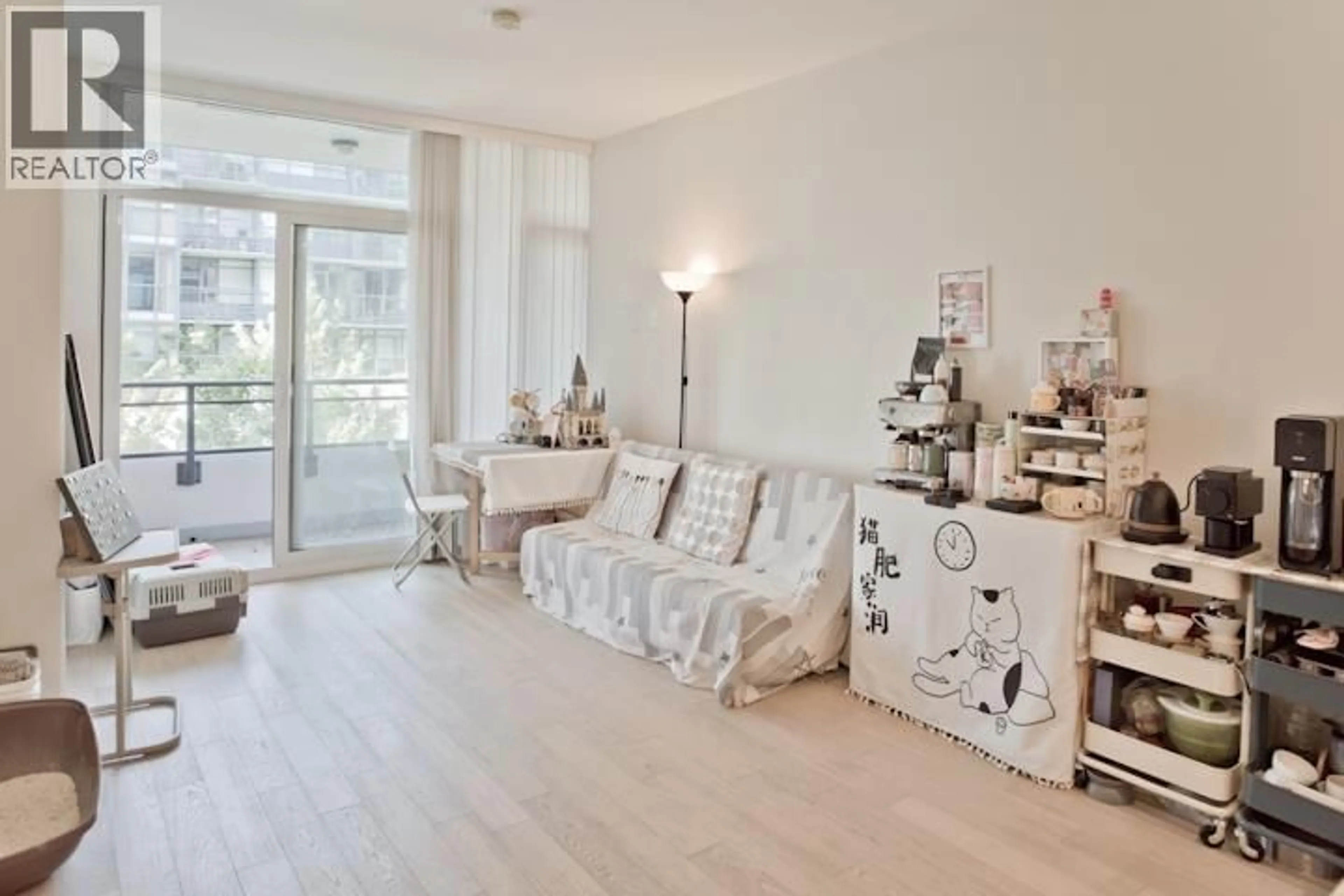 Living room with furniture, wood/laminate floor for 302 - 2033 10TH AVENUE, Vancouver British Columbia V6J0H1