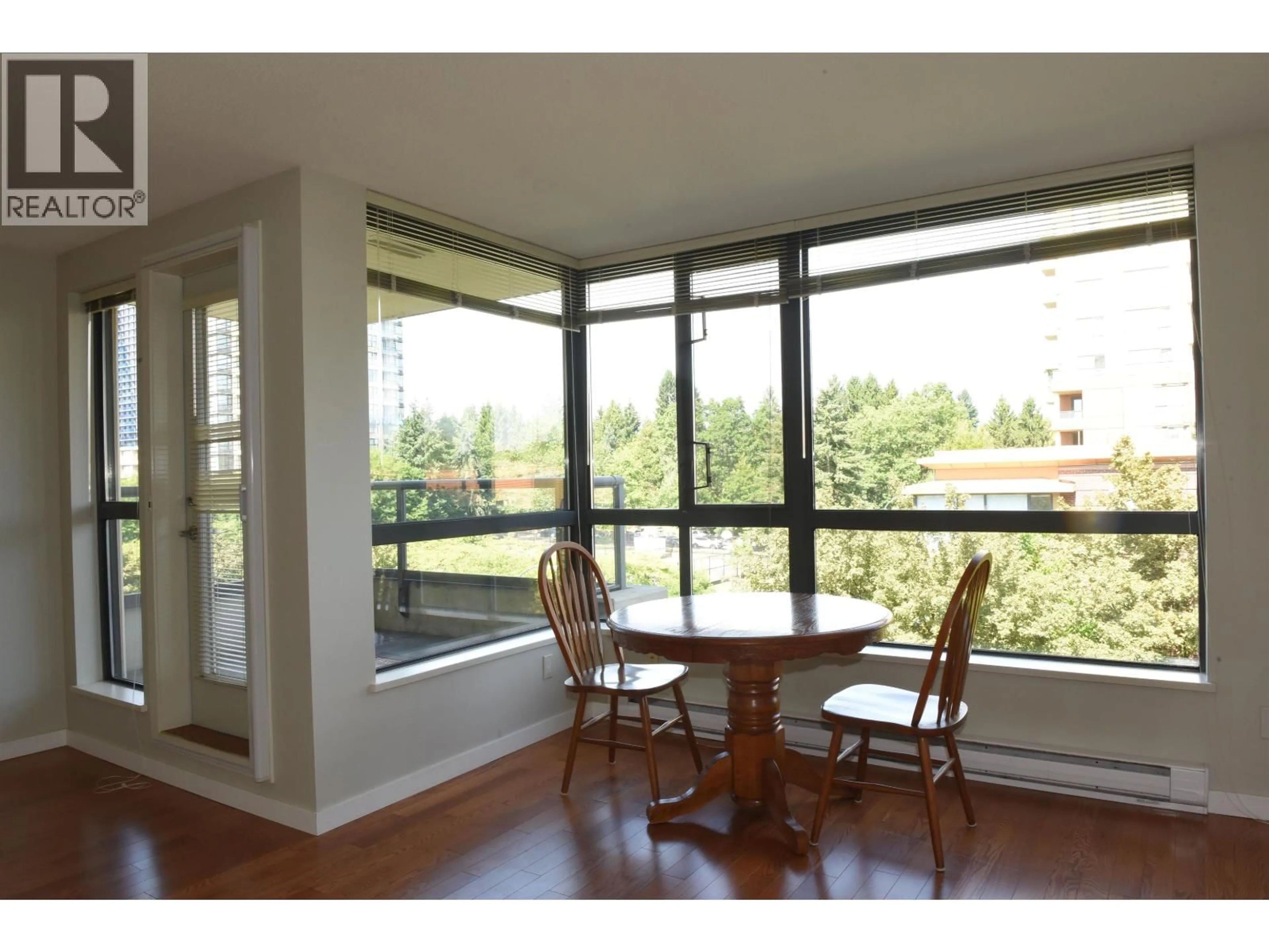 Dining room, wood/laminate floor for 512 - 3588 CROWLEY DRIVE, Vancouver British Columbia V5R6H3