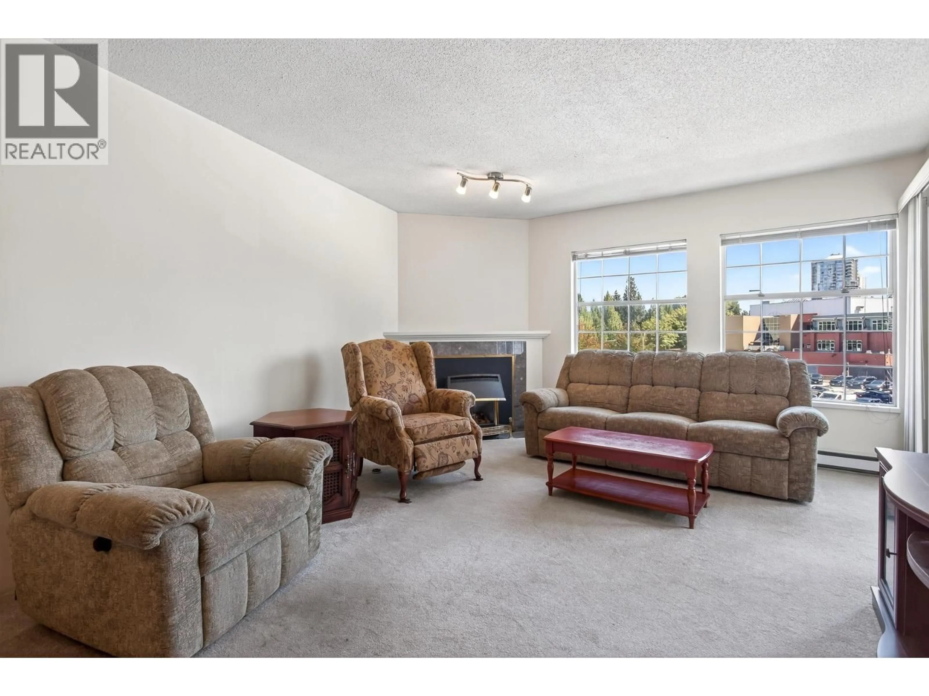 Living room with furniture, carpet floor for 403 - 2973 BURLINGTON DRIVE, Coquitlam British Columbia V3B6X1