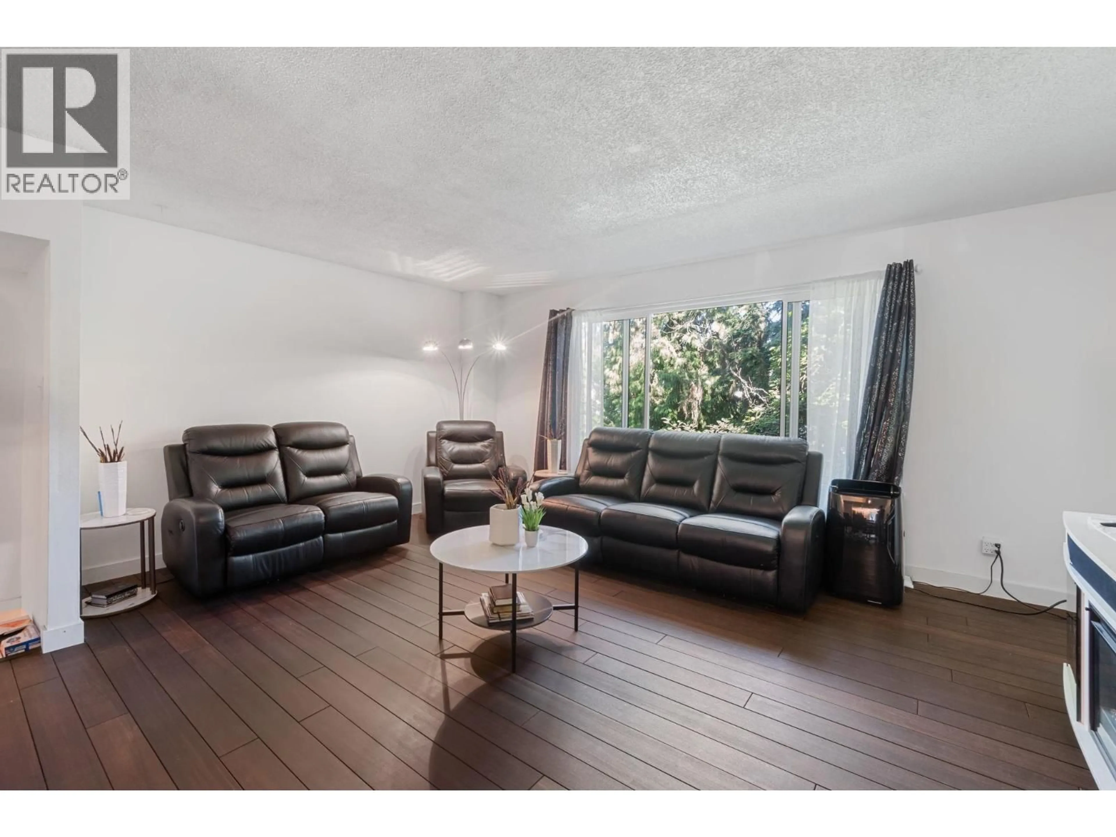 Living room with furniture, wood/laminate floor for 2082 SPRINGER AVENUE, Burnaby British Columbia V5B3M5