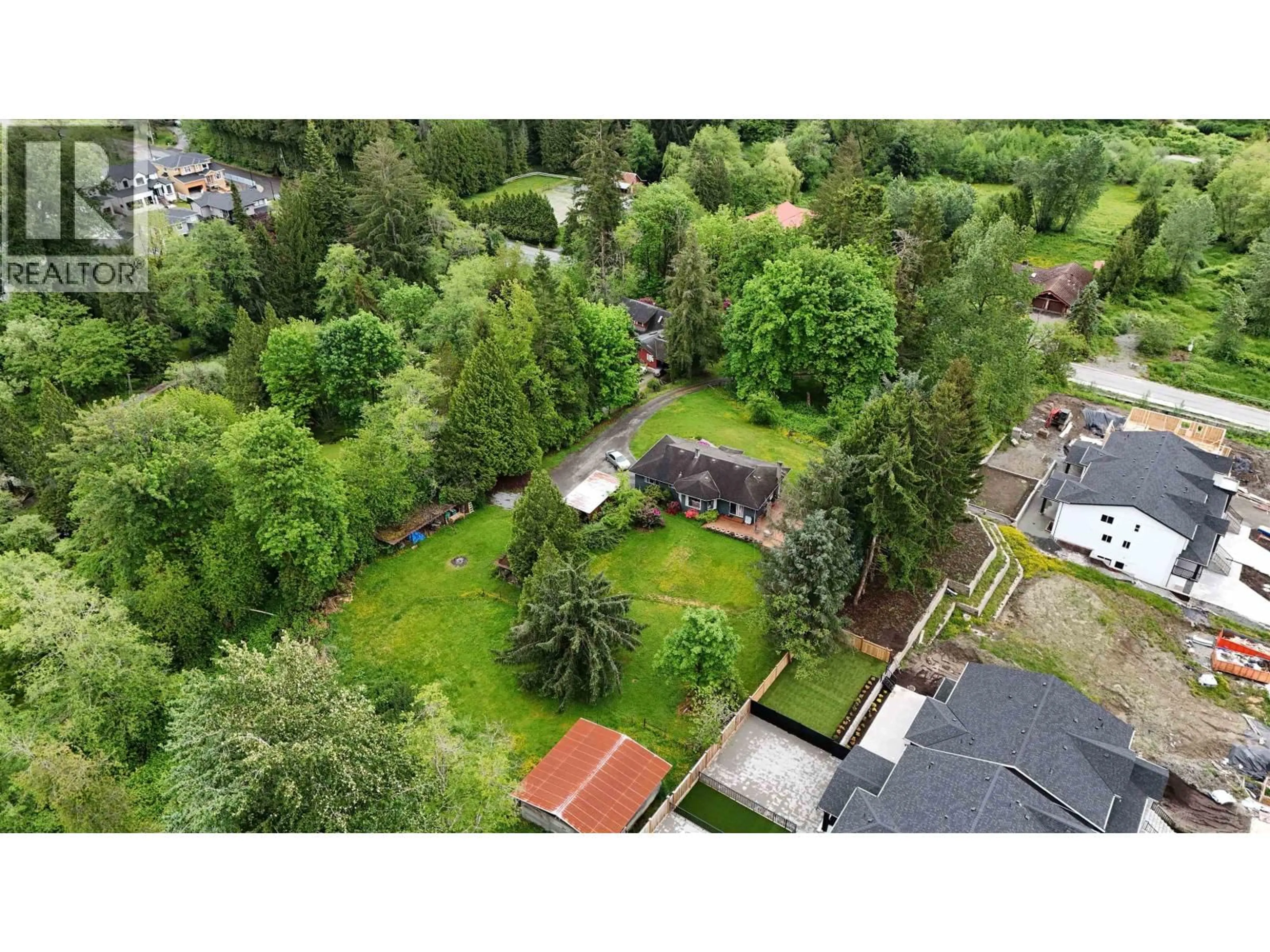 A pic from outside/outdoor area/front of a property/back of a property/a pic from drone, forest/trees view for 24221 110 AVENUE, Maple Ridge British Columbia V2W1H7