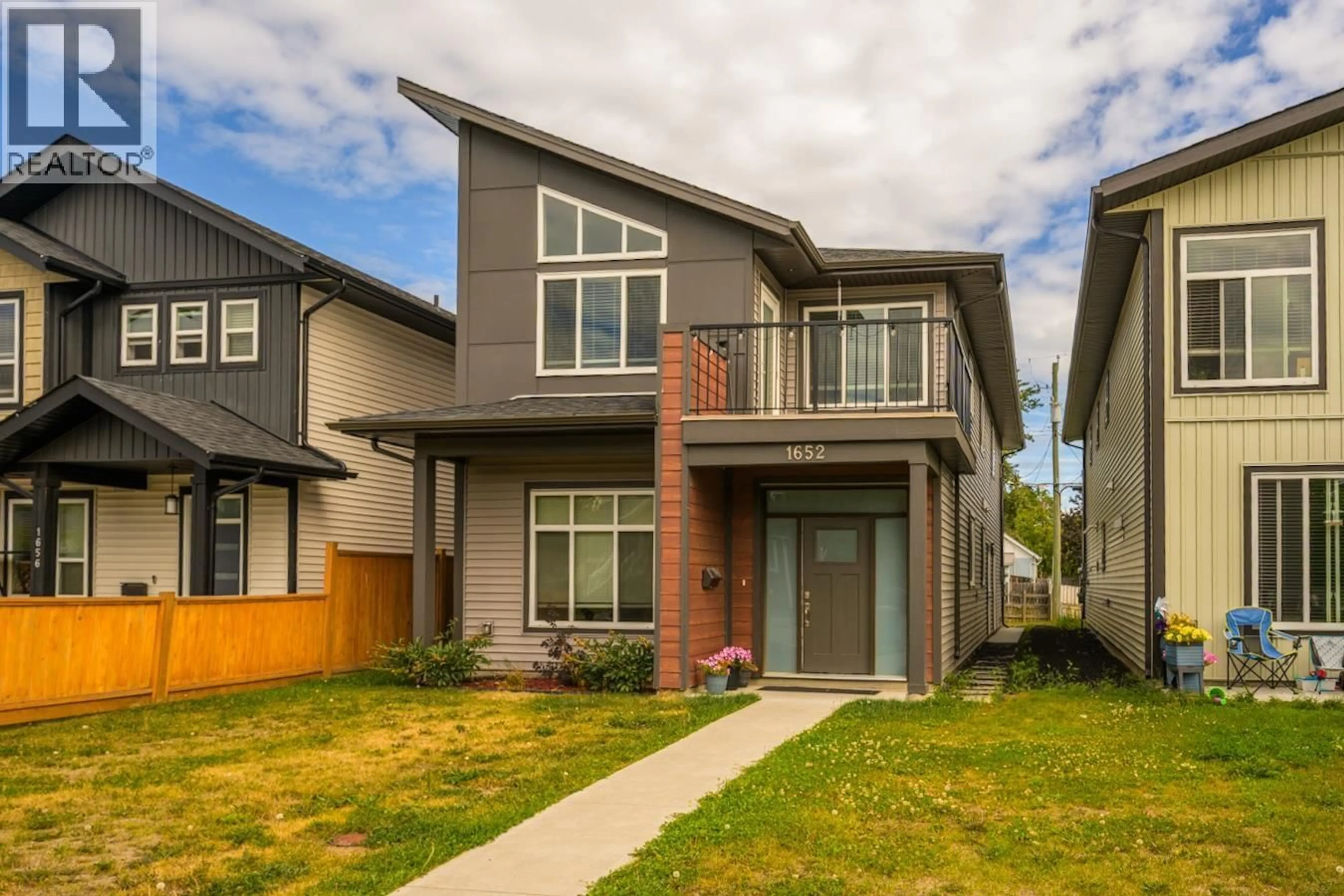Home with brick exterior material, street for 1652 9TH AVENUE, Prince George British Columbia V2L3S1