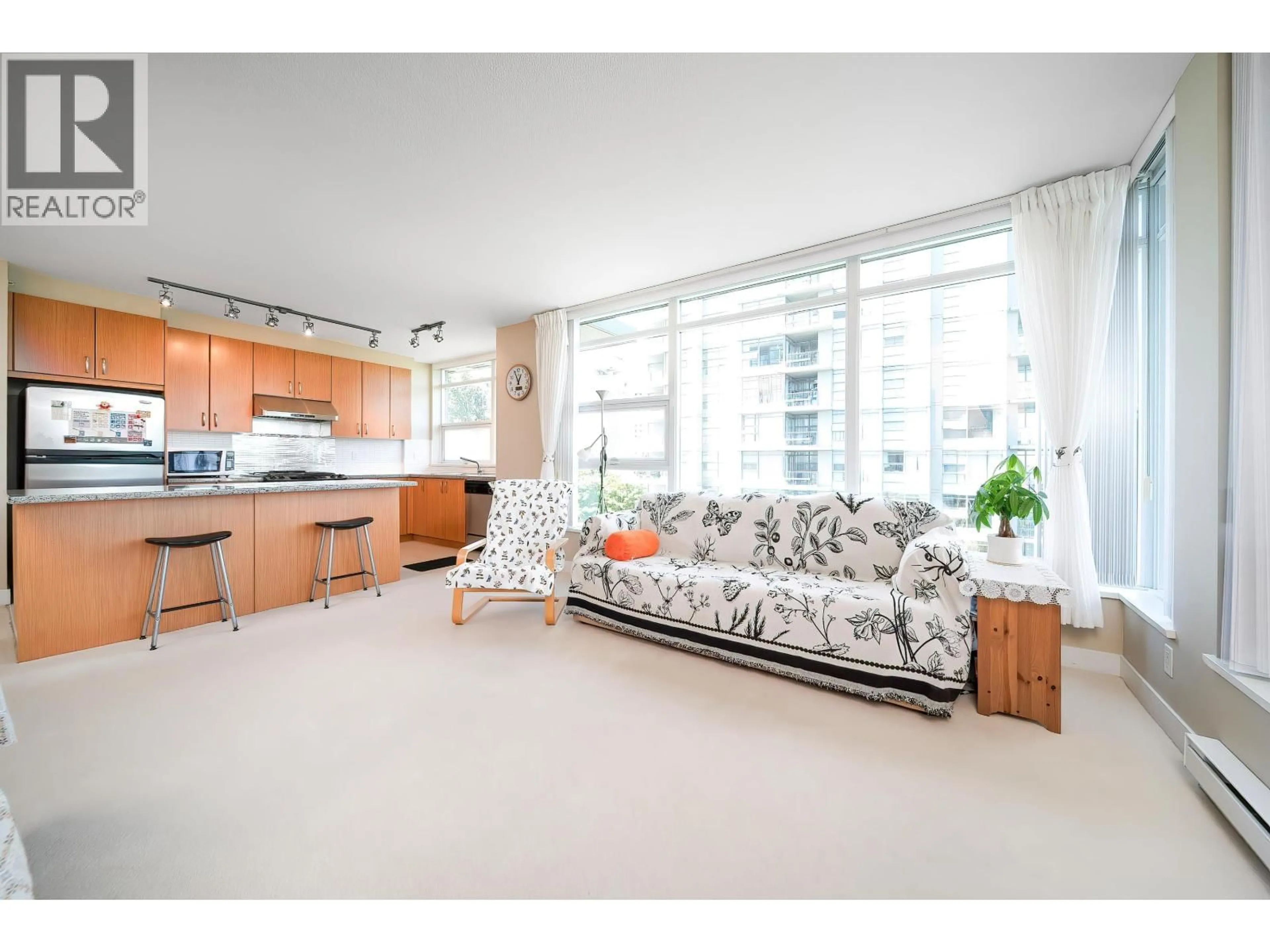 Living room with furniture, unknown for 701 - 9222 UNIVERSITY CRESCENT, Burnaby British Columbia V5A0A6