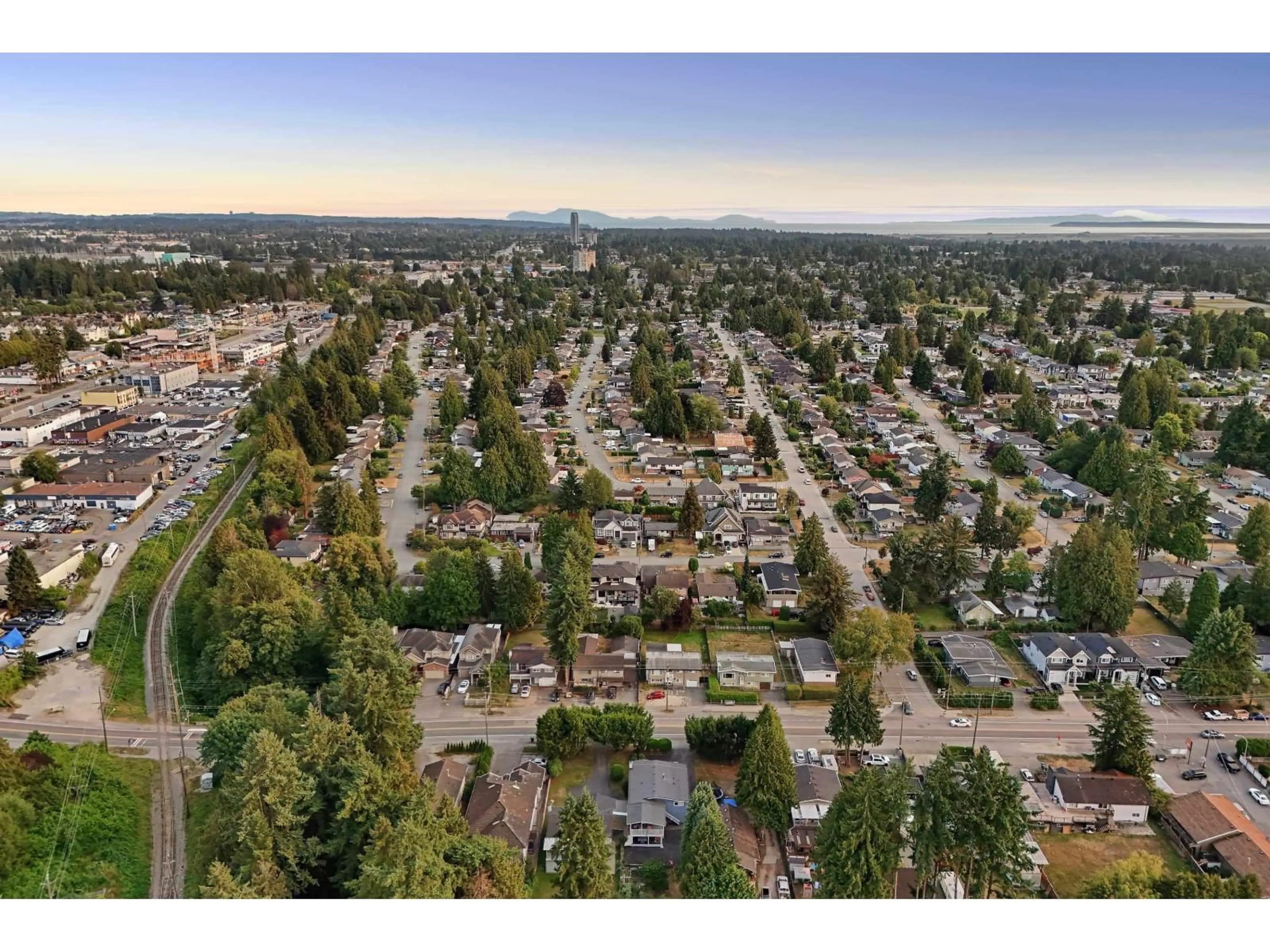 A pic from outside/outdoor area/front of a property/back of a property/a pic from drone, mountain view for 11831 96, Surrey British Columbia V3V1W1