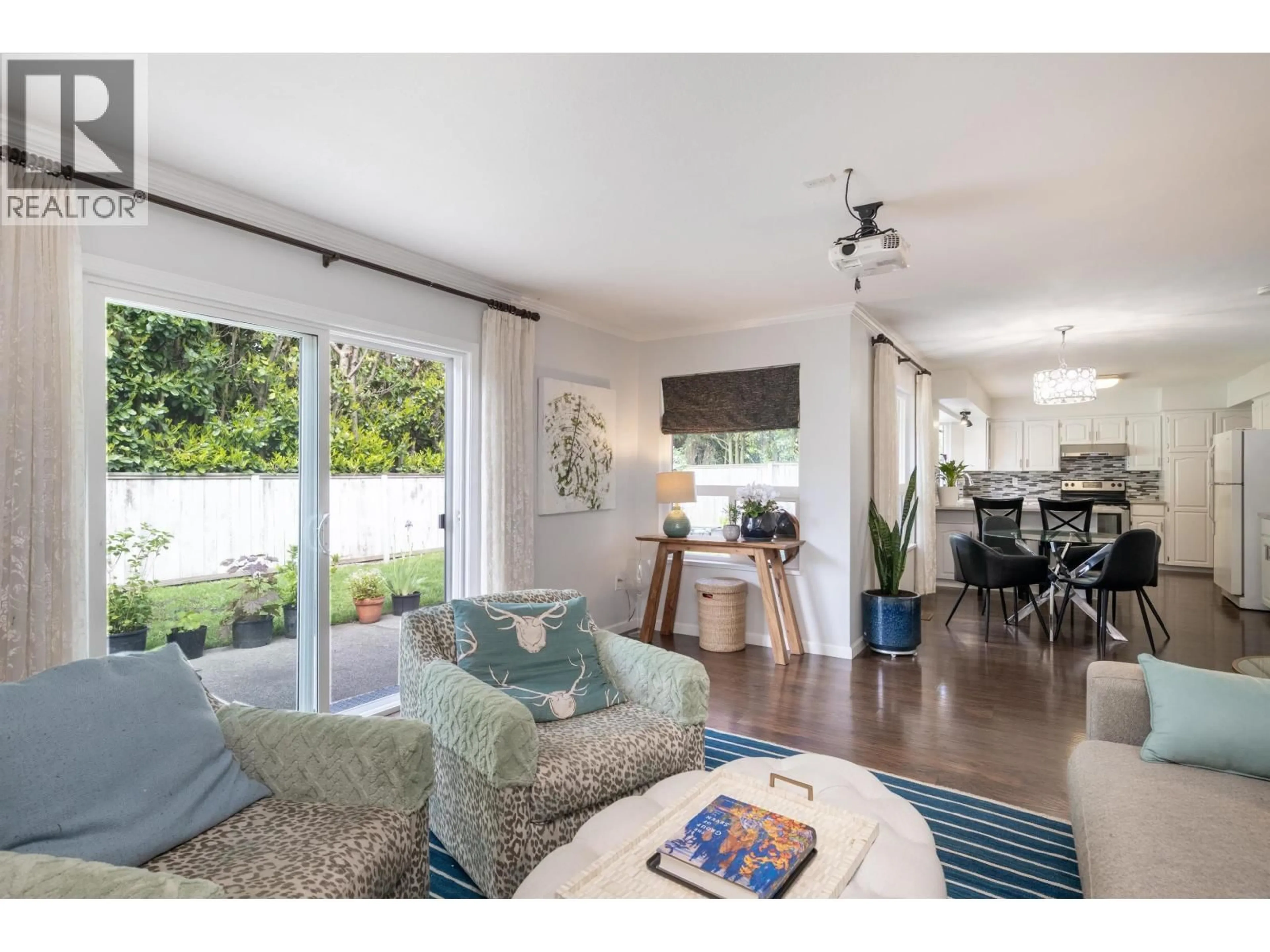 Open concept kitchen, wood/laminate floor for 4431 50A STREET, Delta British Columbia V4K4M2