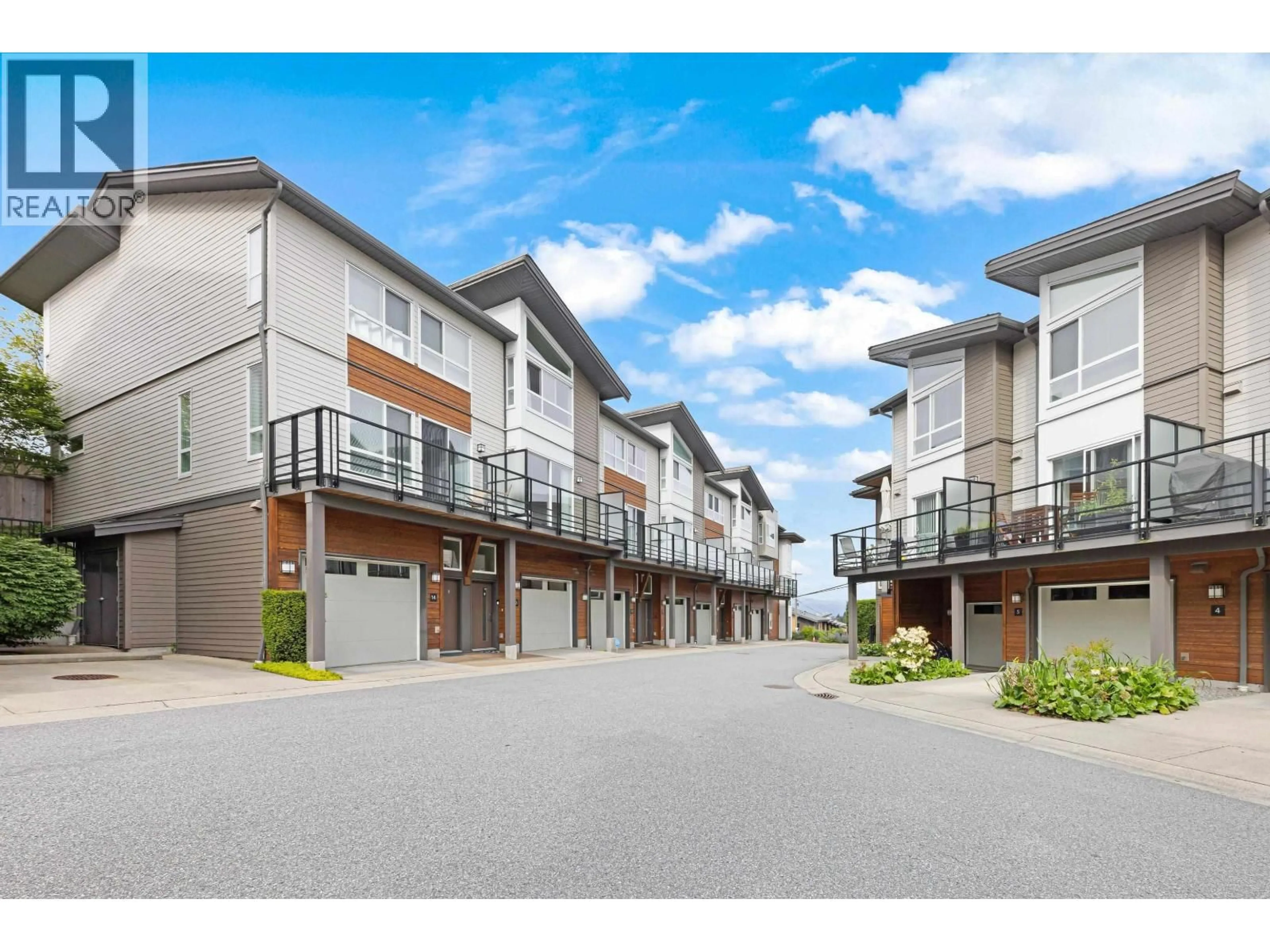 A pic from outside/outdoor area/front of a property/back of a property/a pic from drone, street for 13 - 909 CLARKE ROAD, Port Moody British Columbia V3H1L6