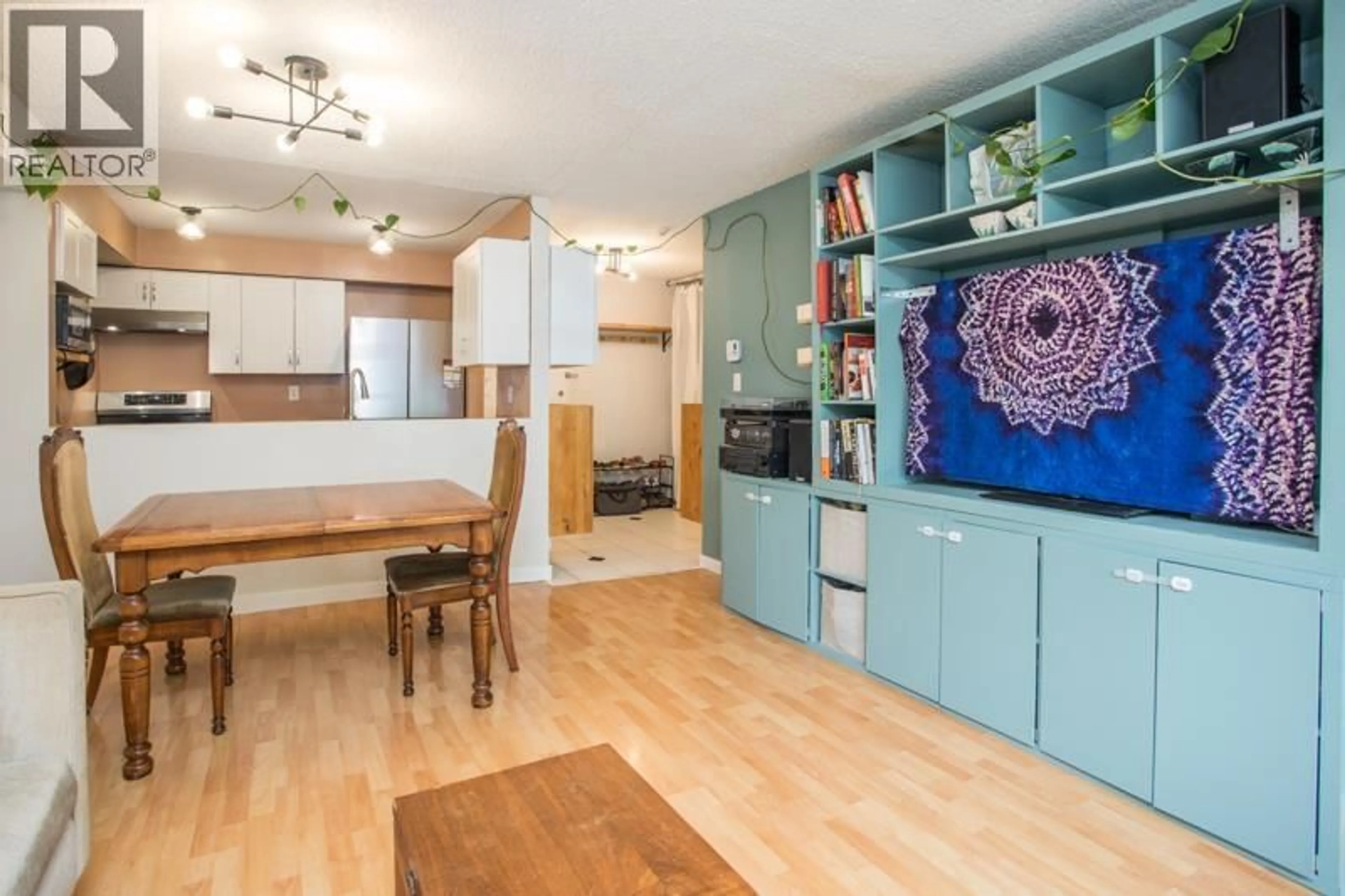 Open concept kitchen, wood/laminate floor for 106 - 1040 BROADWAY STREET, Vancouver British Columbia V5T4N7