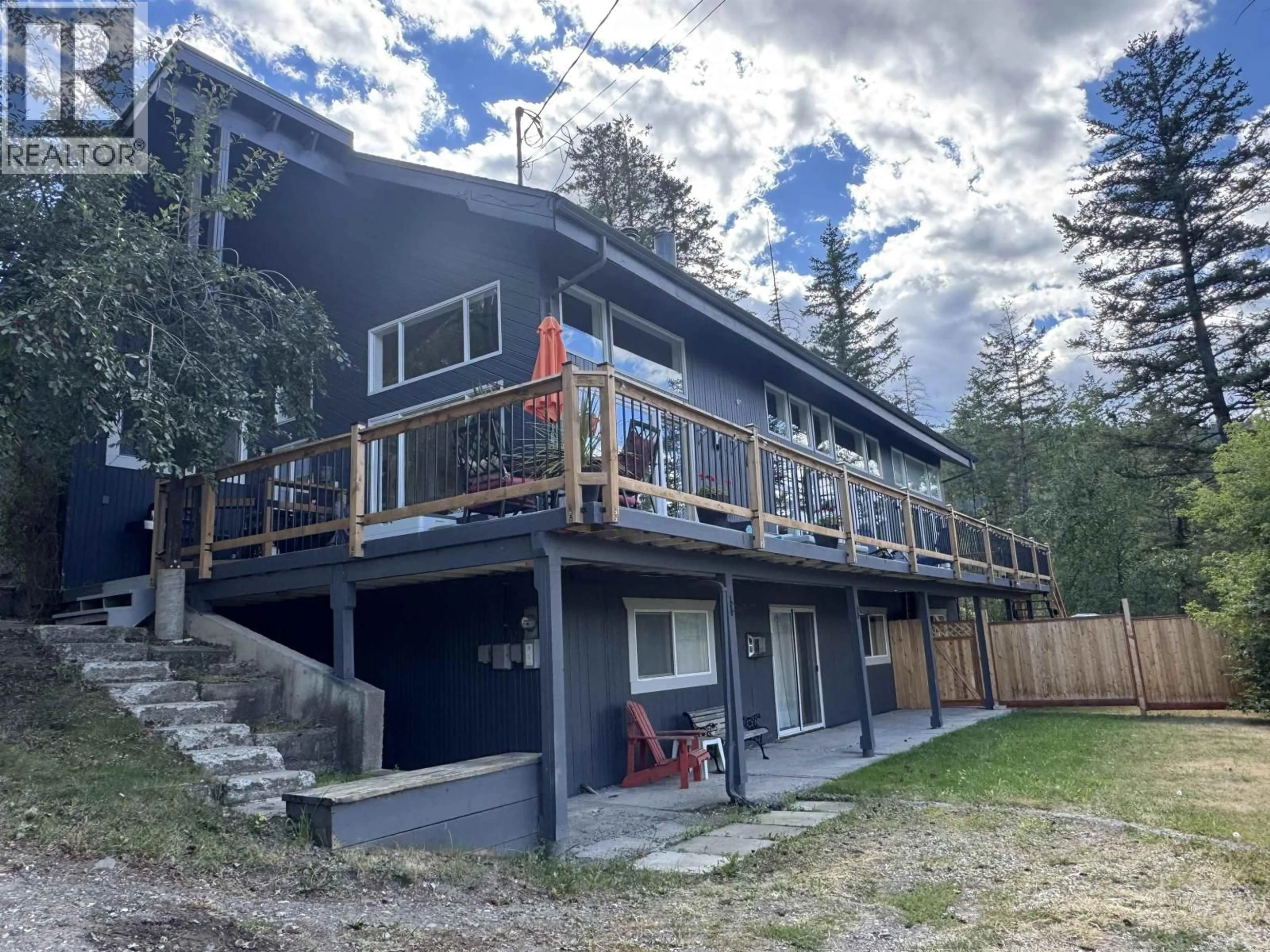 A pic from outside/outdoor area/front of a property/back of a property/a pic from drone, water/lake/river/ocean view for 2124 SOUTH LAKESIDE DRIVE, Williams Lake British Columbia V2G5G4
