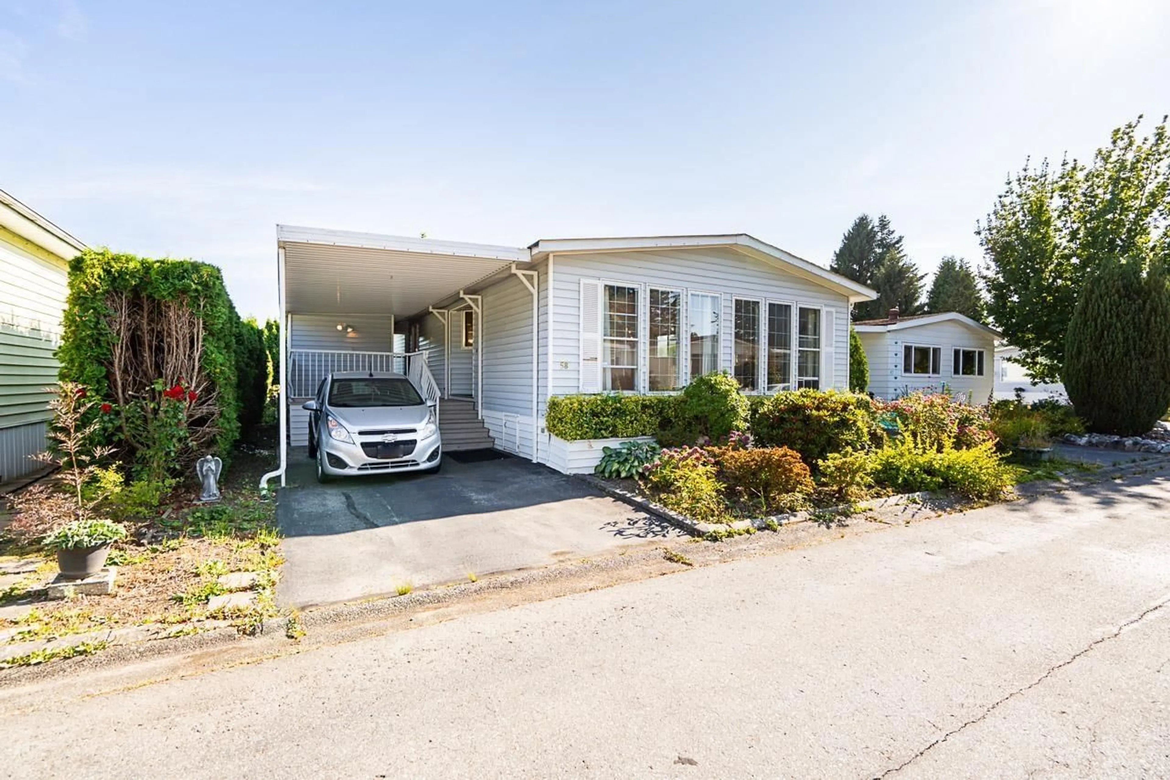 Home with vinyl exterior material, street for 58 - 2303 CRANLEY, Surrey British Columbia V4A4X3