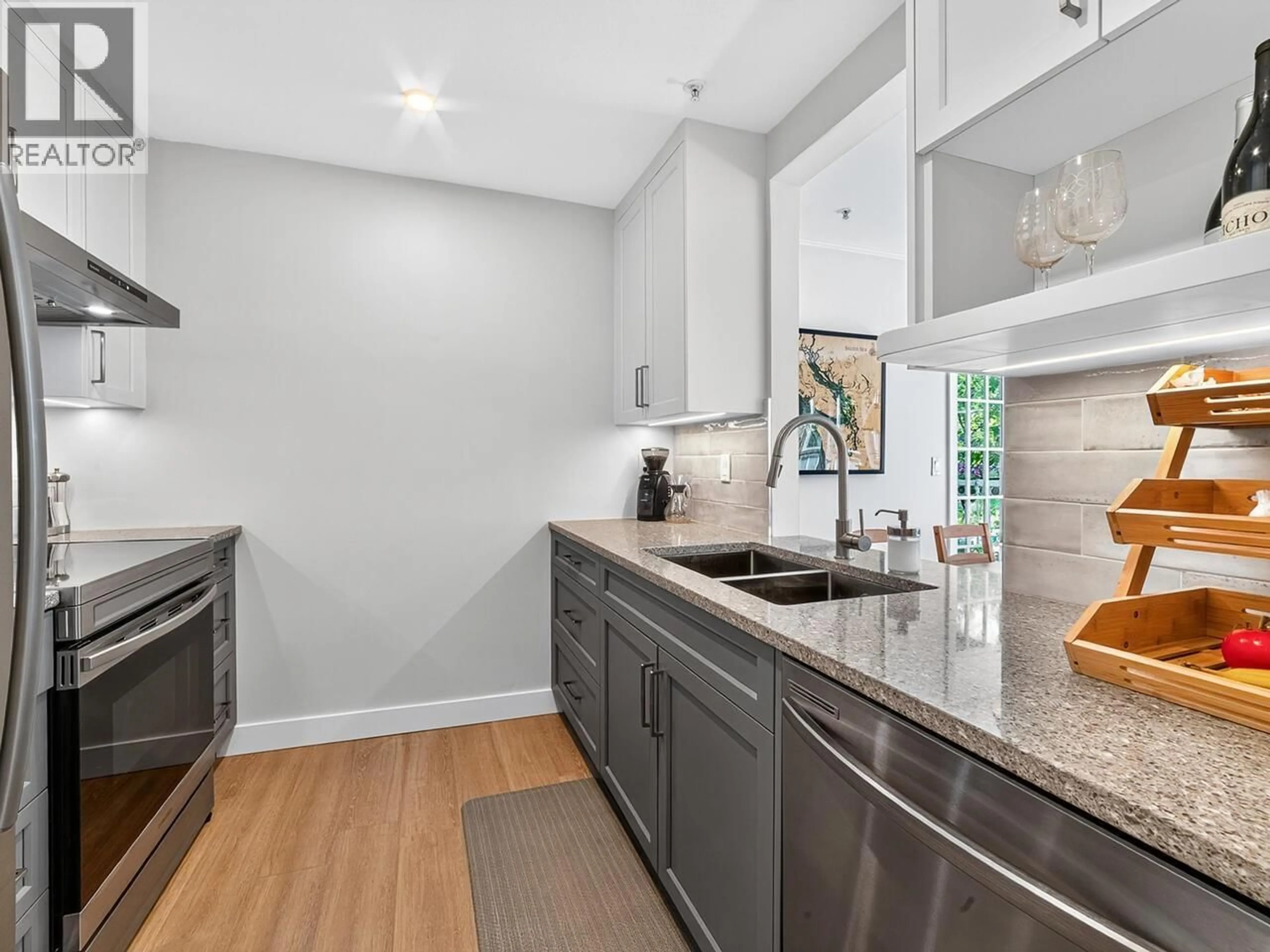 Open concept kitchen, ceramic/tile floor for 205 - 1915 GEORGIA STREET, Vancouver British Columbia V5L2B7