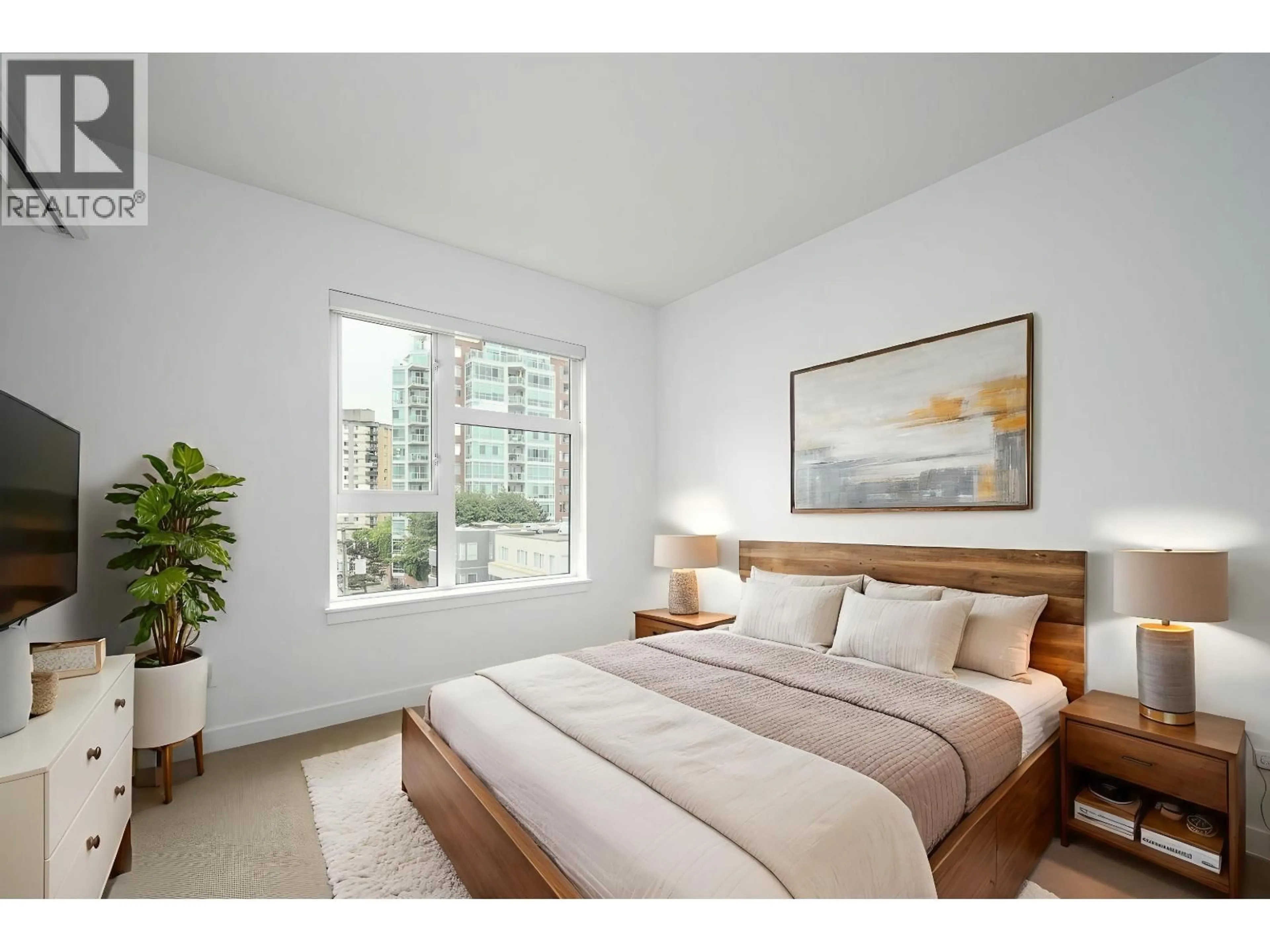 Bedroom with bed, wood/laminate floor for 414 - 111 3RD STREET, North Vancouver British Columbia V7L0C6