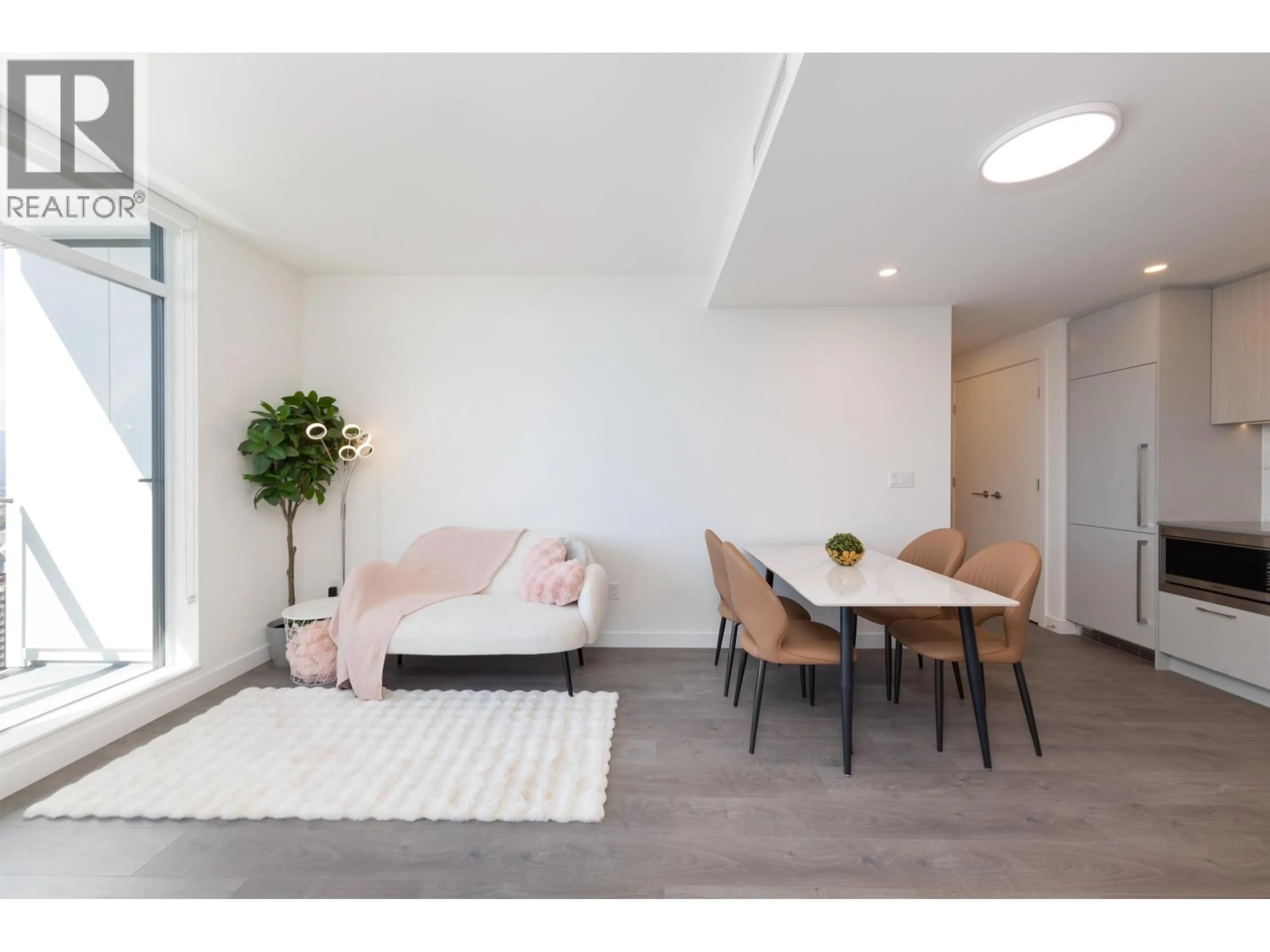 Living room with furniture, wood/laminate floor for 3405 - 6468 WILLINGDON AVENUE, Burnaby British Columbia V5H0L3