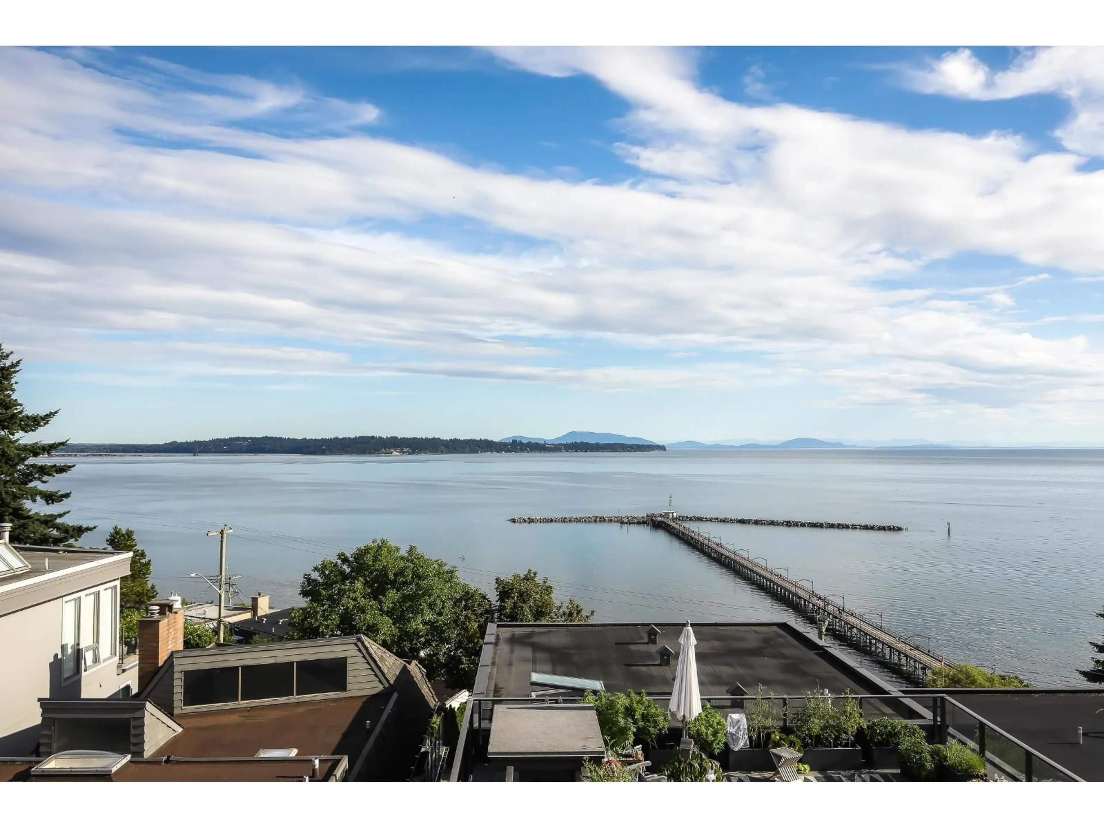A pic from outside/outdoor area/front of a property/back of a property/a pic from drone, water/lake/river/ocean view for 15062 ROYAL, White Rock British Columbia V4B1L9