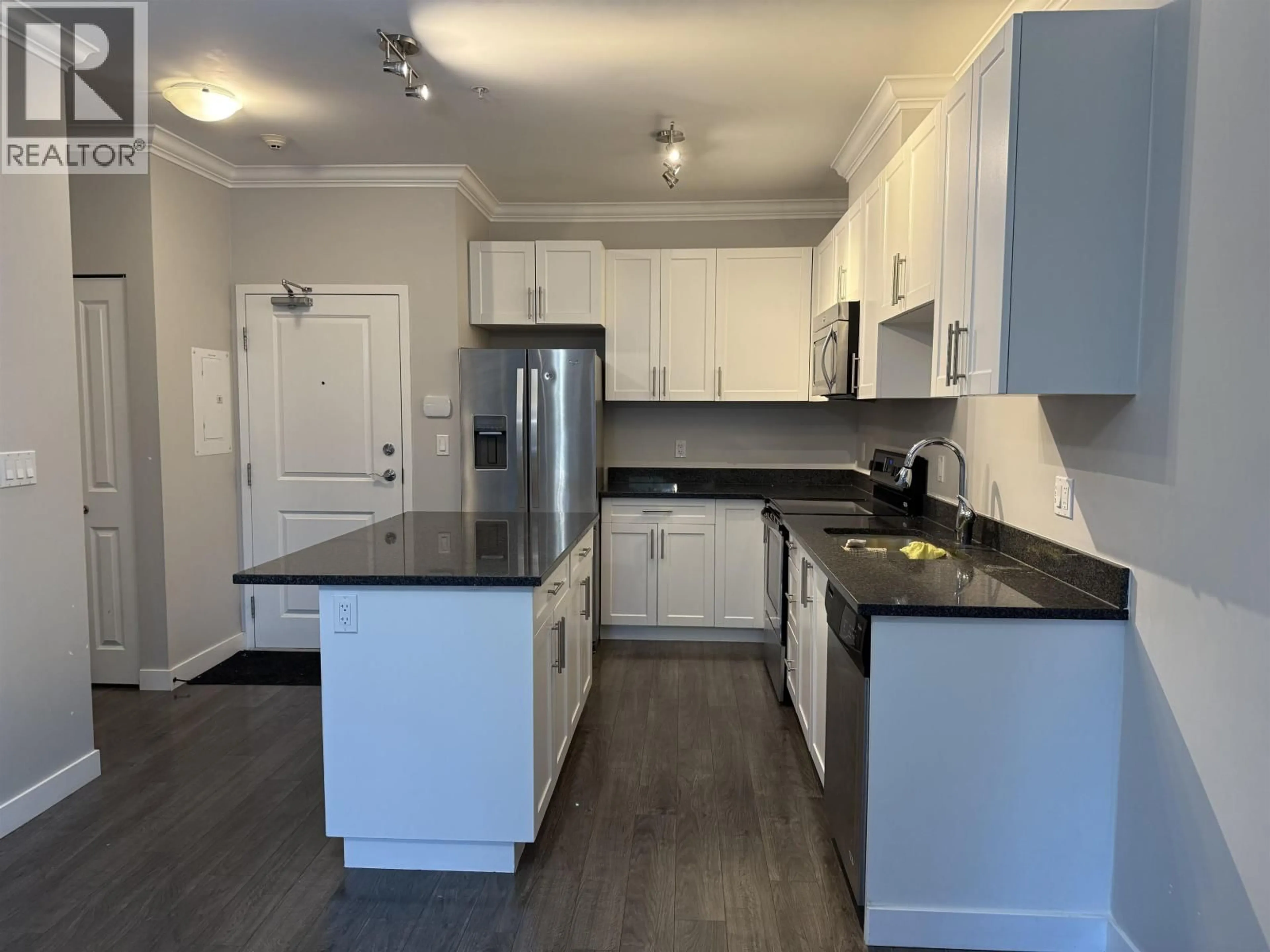 Open concept kitchen, wood/laminate floor for 105 - 11580 223 STREET, Maple Ridge British Columbia V2X9H1