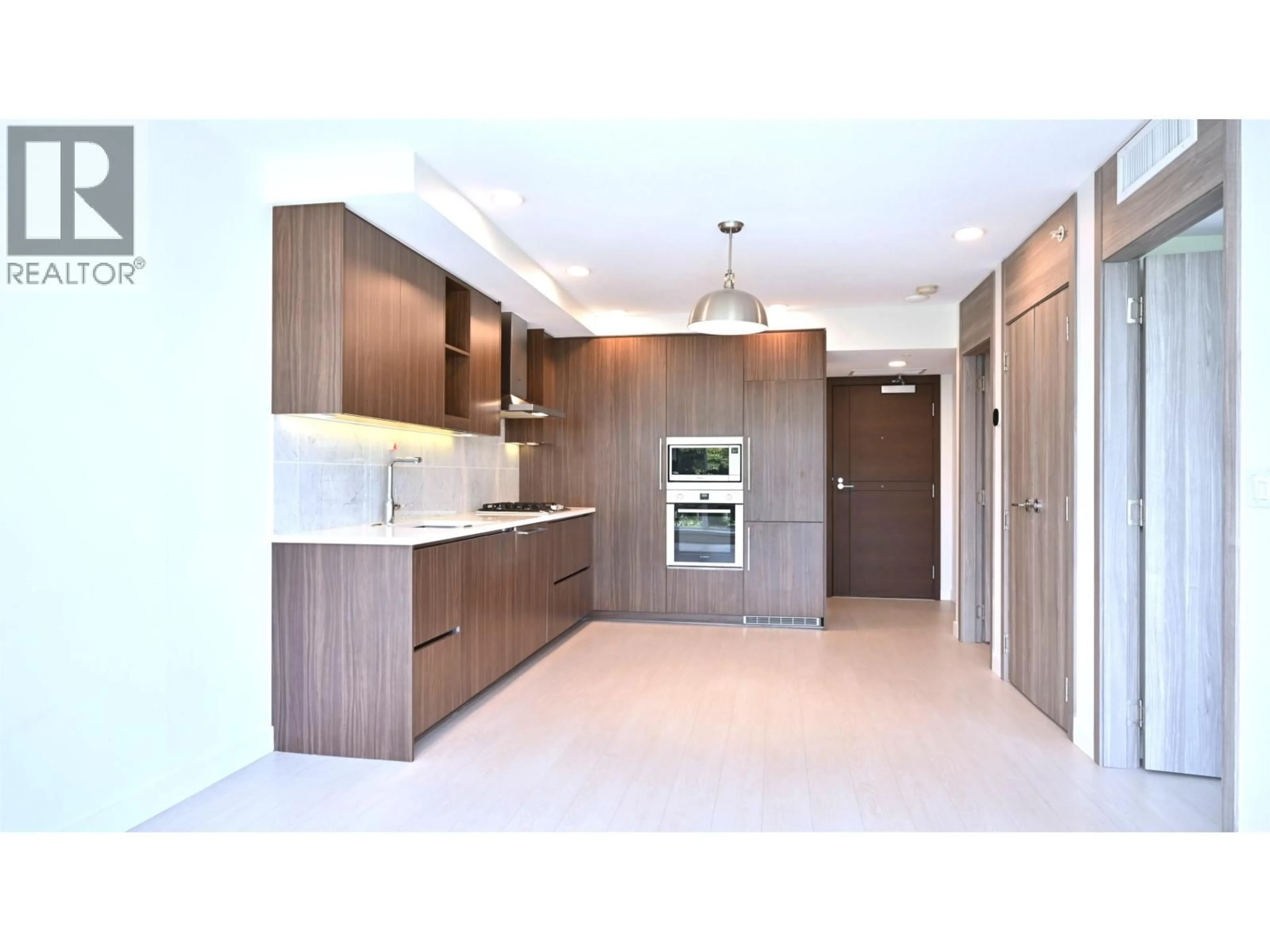 Open concept kitchen, unknown for 1608 - 8800 HAZELBRIDGE WAY, Richmond British Columbia V6X0S3