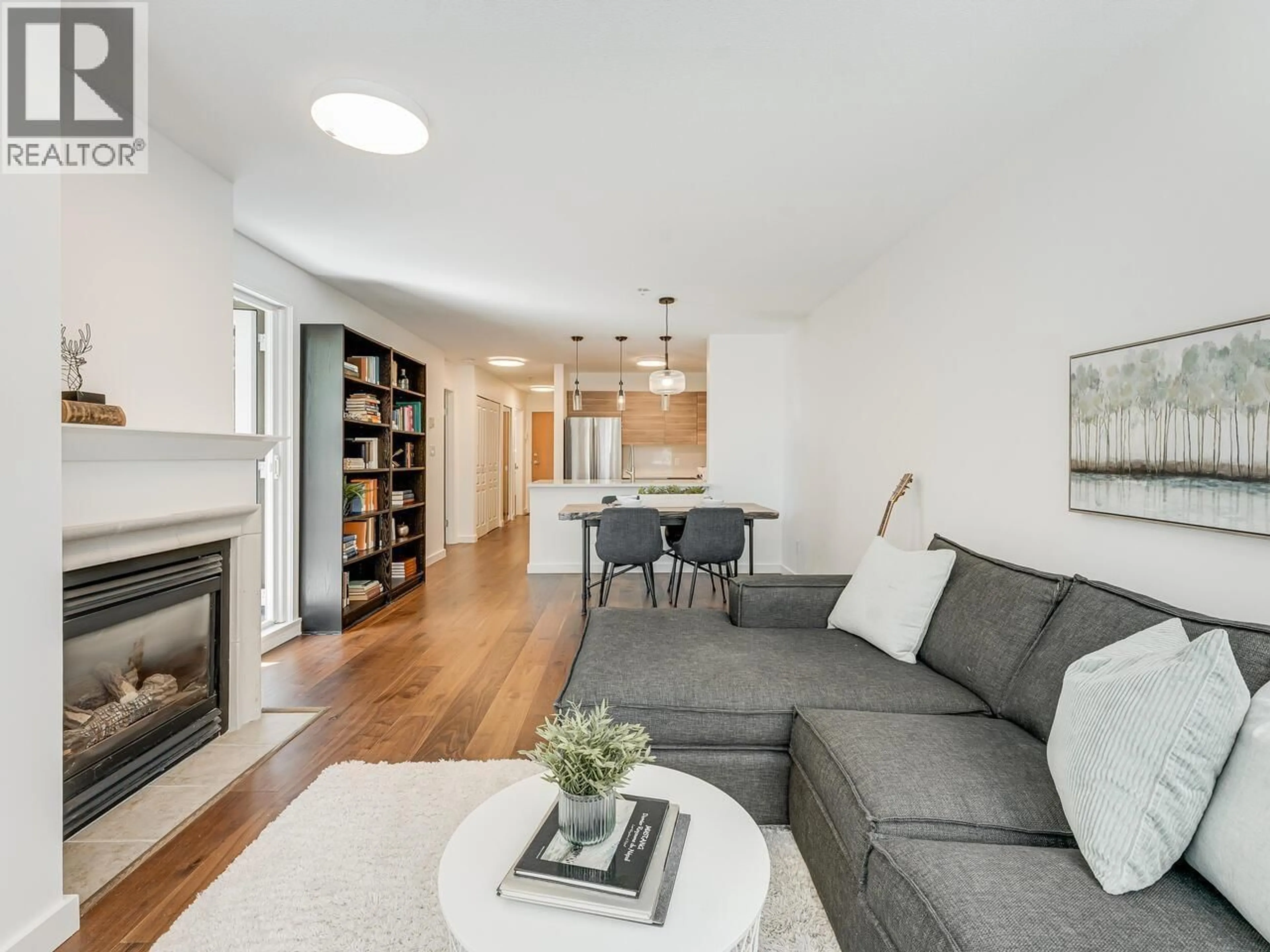 Living room with furniture, wood/laminate floor for 204 - 2181 12TH AVENUE, Vancouver British Columbia V6K4S8