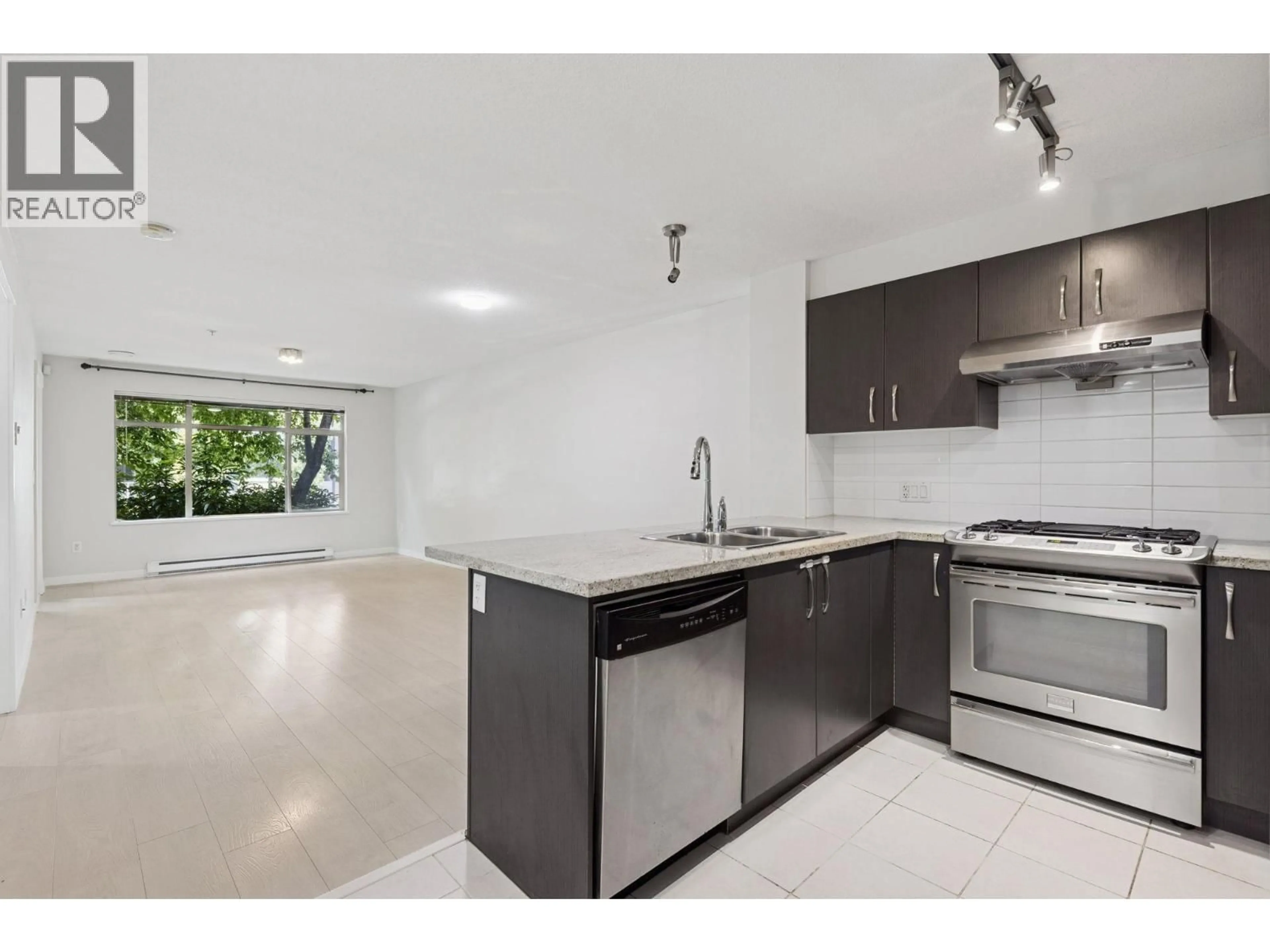 Open concept kitchen, unknown for 101 - 9288 ODLIN ROAD, Richmond British Columbia V6X0C3
