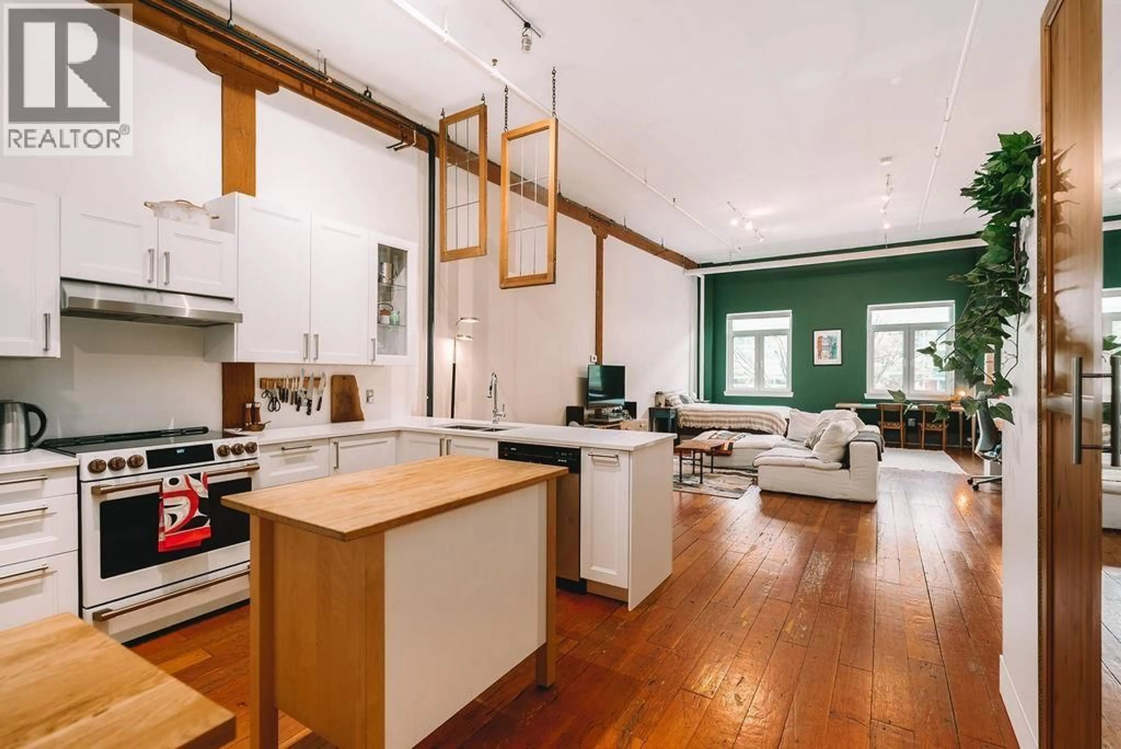 Open concept kitchen, wood/laminate floor for 306 - 2556 HASTINGS STREET, Vancouver British Columbia V5K1Z3