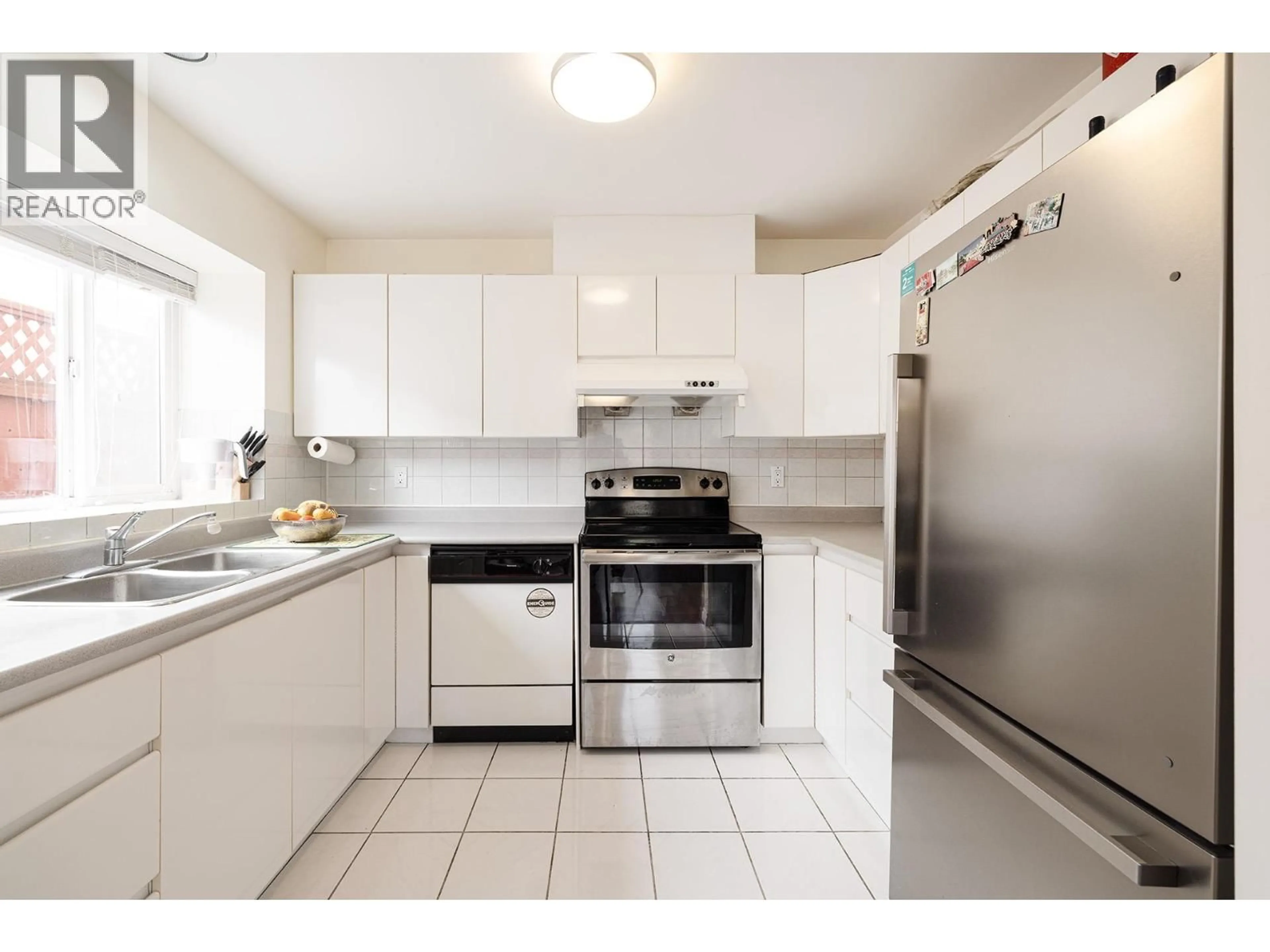Standard kitchen, ceramic/tile floor for 8573 LAUREL STREET, Vancouver British Columbia V6P2X6