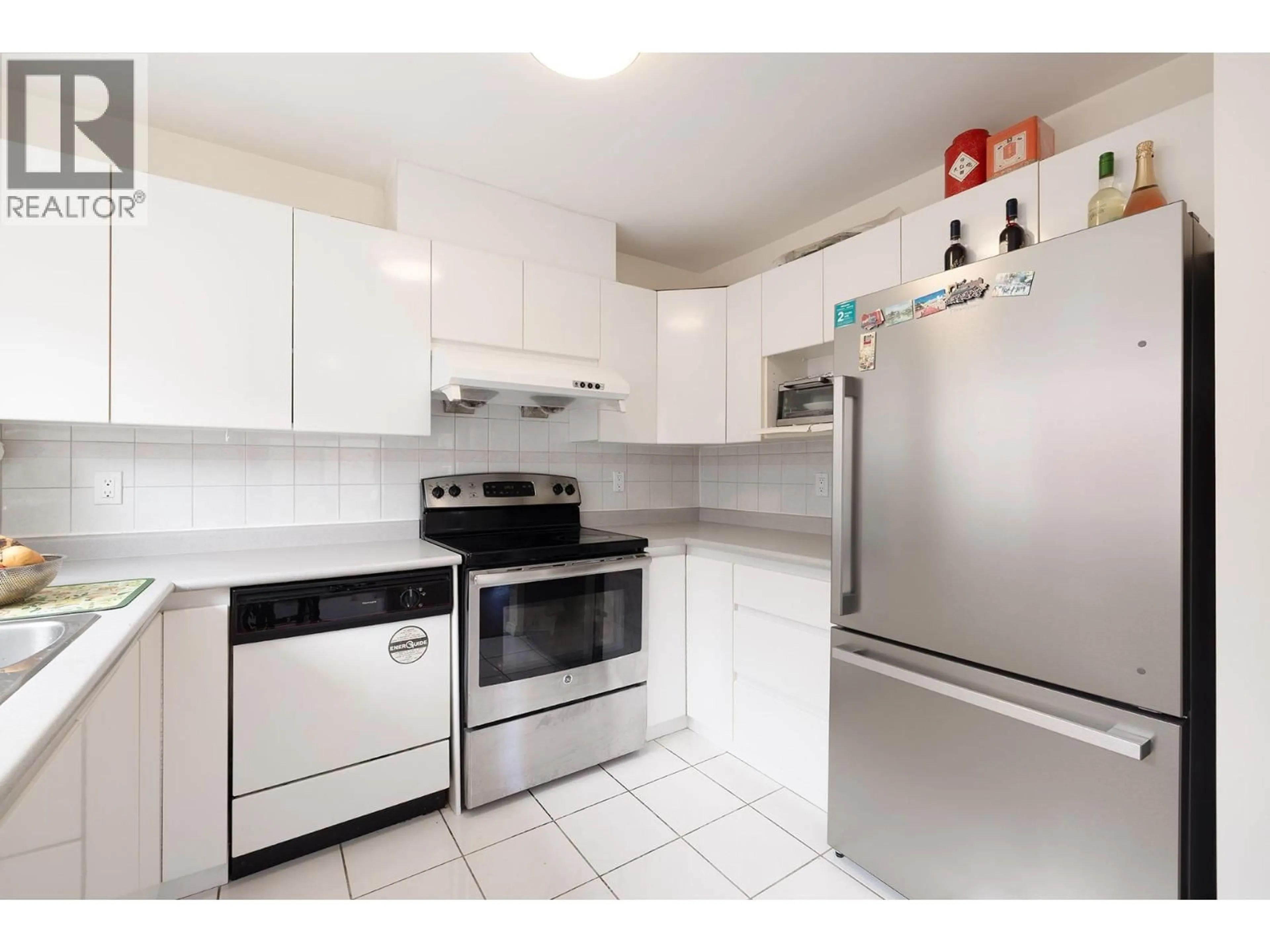 Standard kitchen, ceramic/tile floor for 8573 LAUREL STREET, Vancouver British Columbia V6P2X6