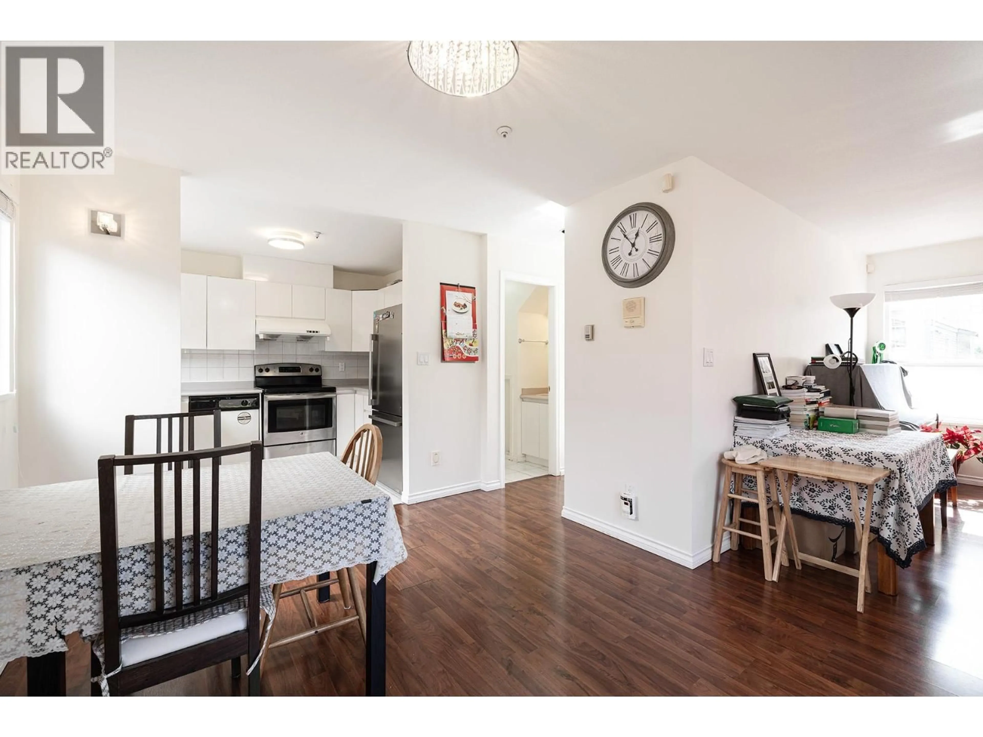 Open concept kitchen, wood/laminate floor for 8573 LAUREL STREET, Vancouver British Columbia V6P2X6