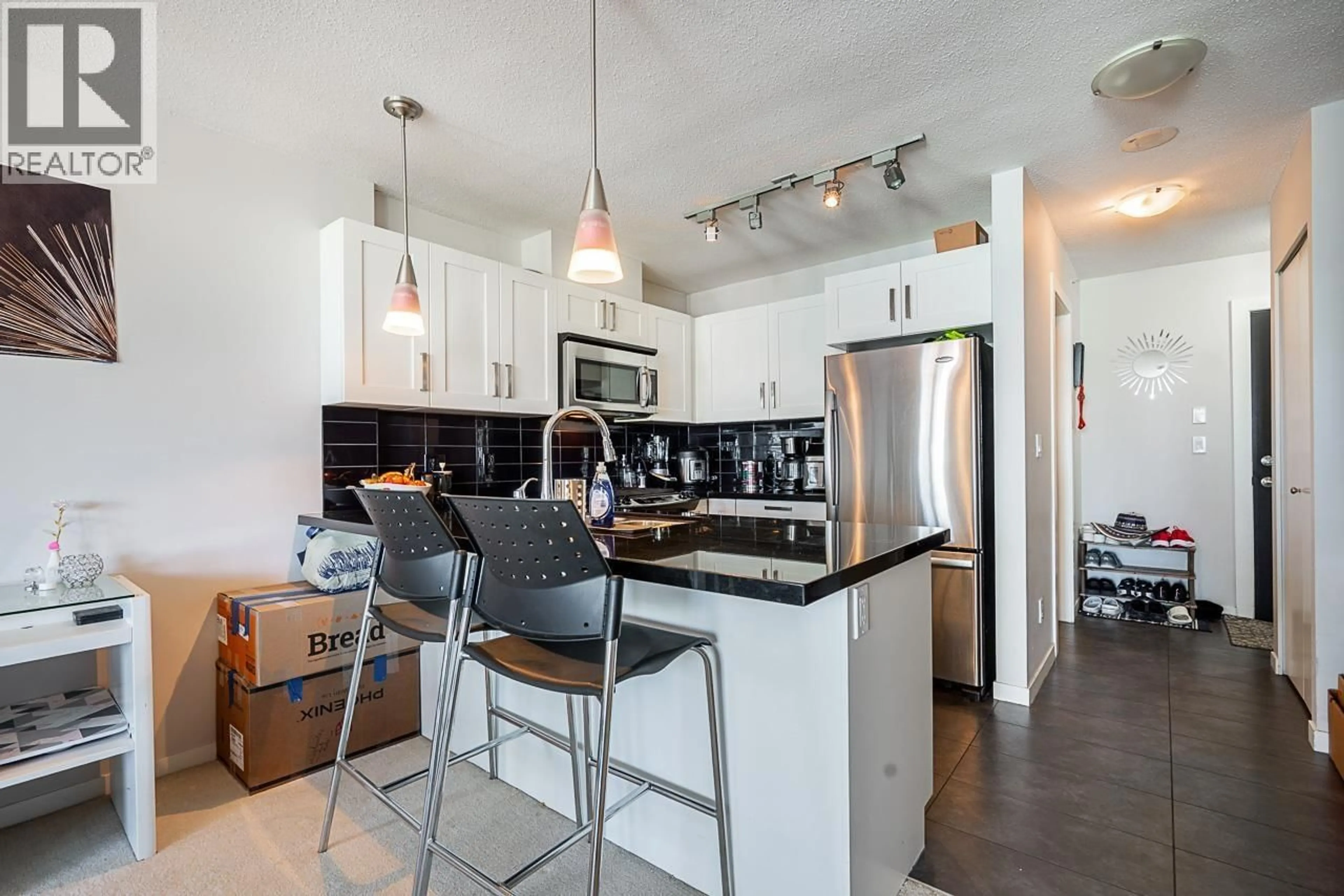 Open concept kitchen, ceramic/tile floor for 2305 - 2133 DOUGLAS ROAD, Burnaby British Columbia V5C0E9