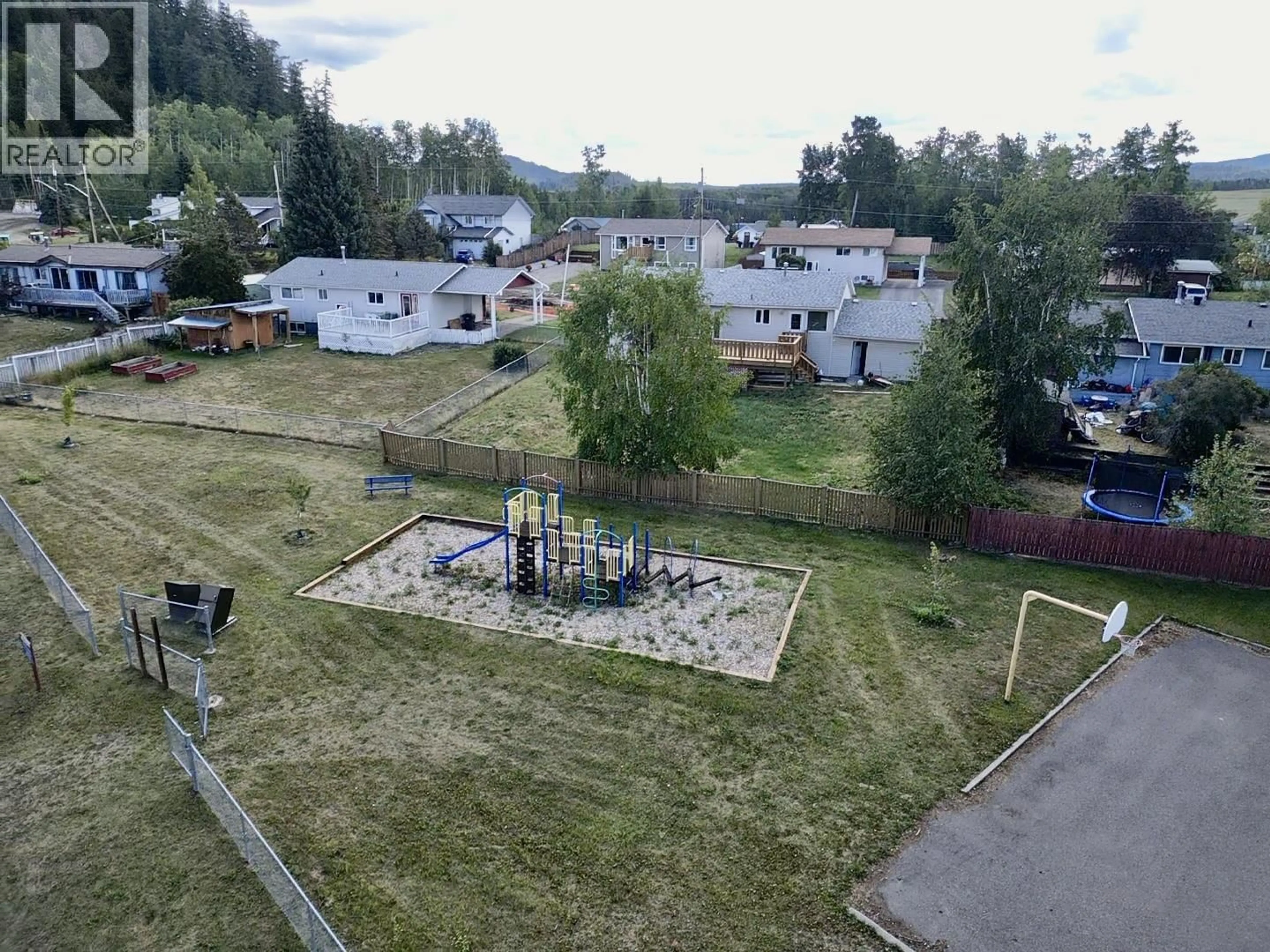A pic from outside/outdoor area/front of a property/back of a property/a pic from drone, mountain view for 525 TUNASA DRIVE, Fraser Lake British Columbia V0J1S0