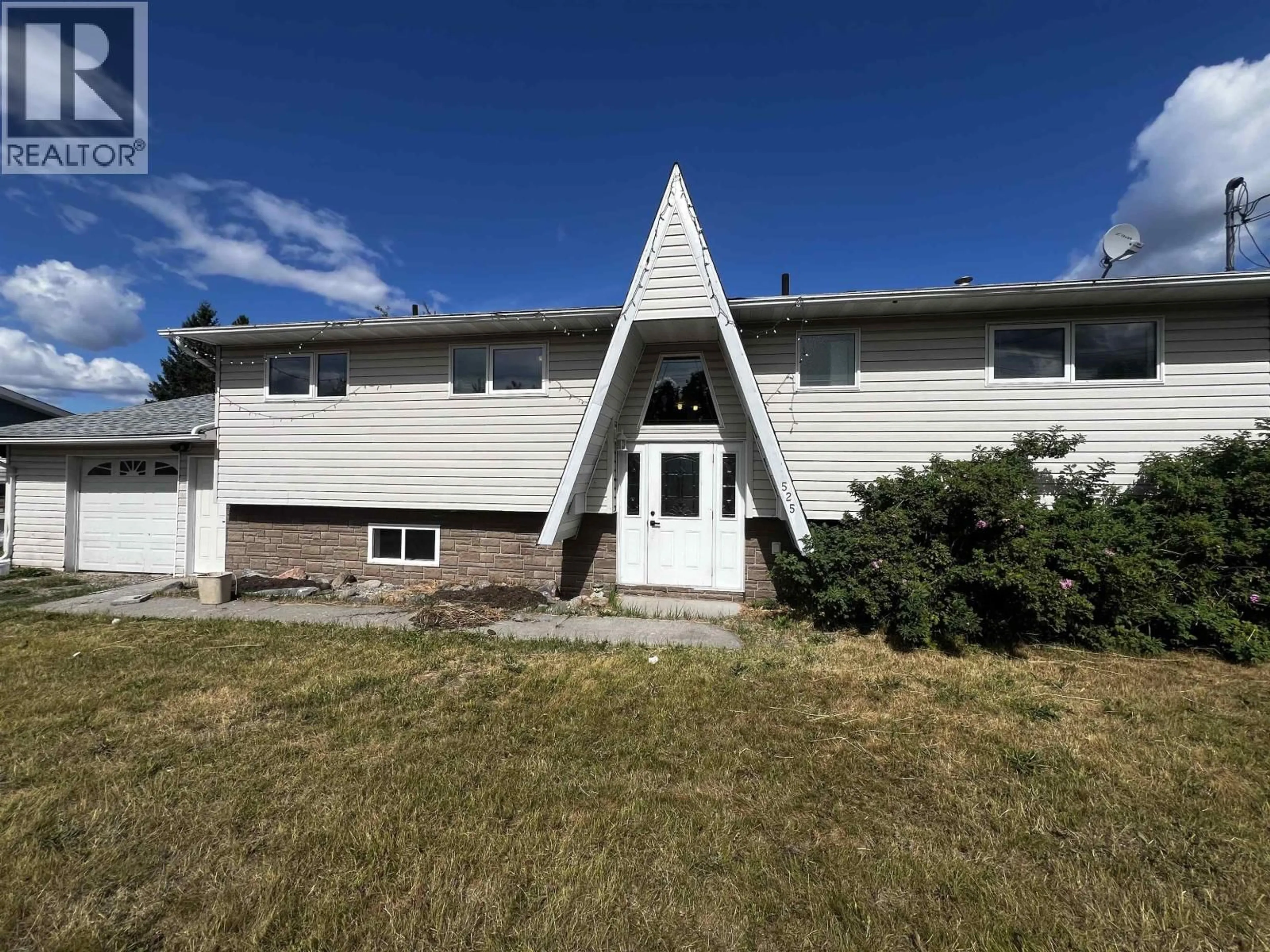 Home with vinyl exterior material, mountain view for 525 TUNASA DRIVE, Fraser Lake British Columbia V0J1S0