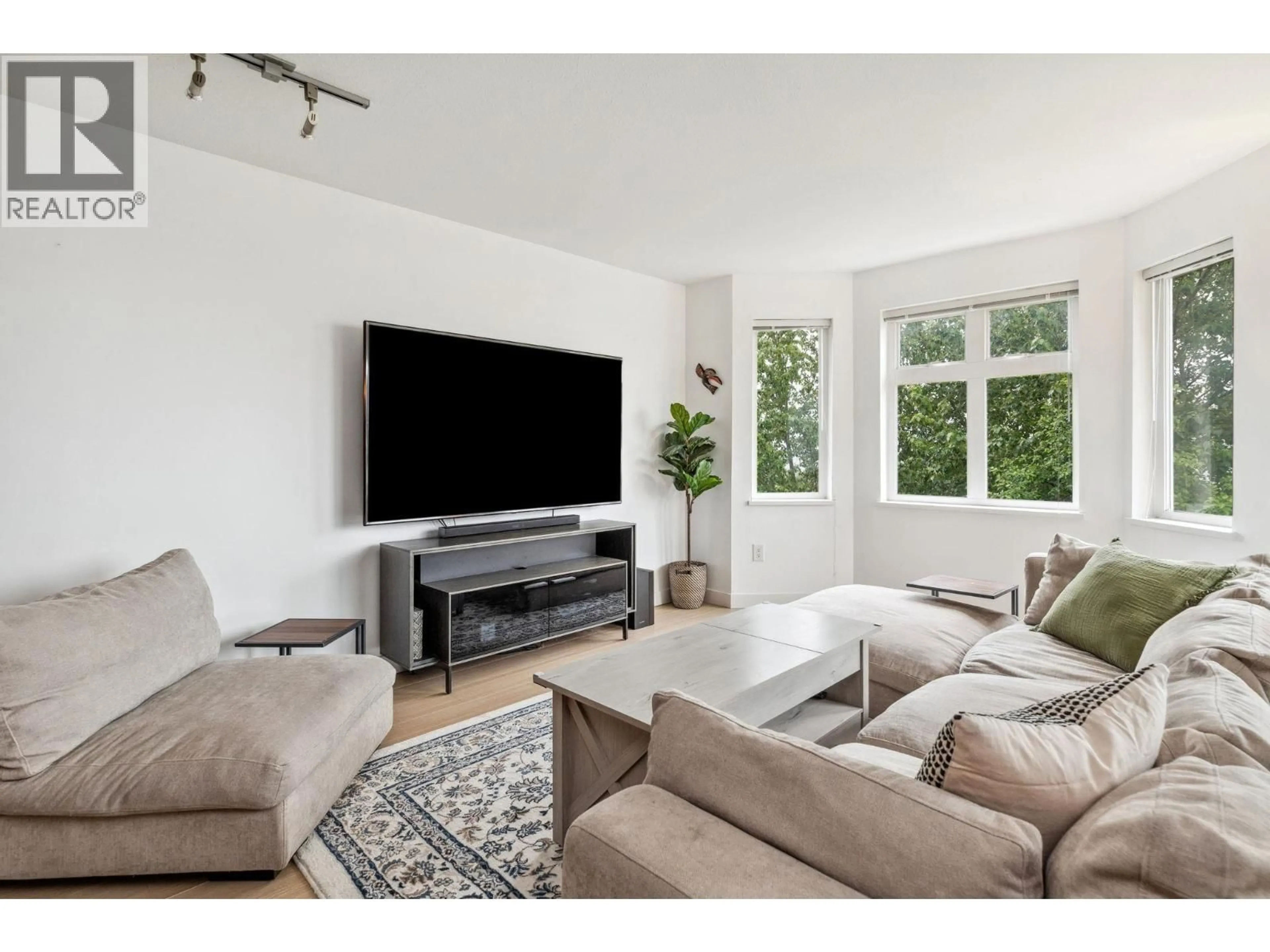 Living room with furniture, unknown for 501 - 160 SHORELINE CIRCLE, Port Moody British Columbia V3H0B2