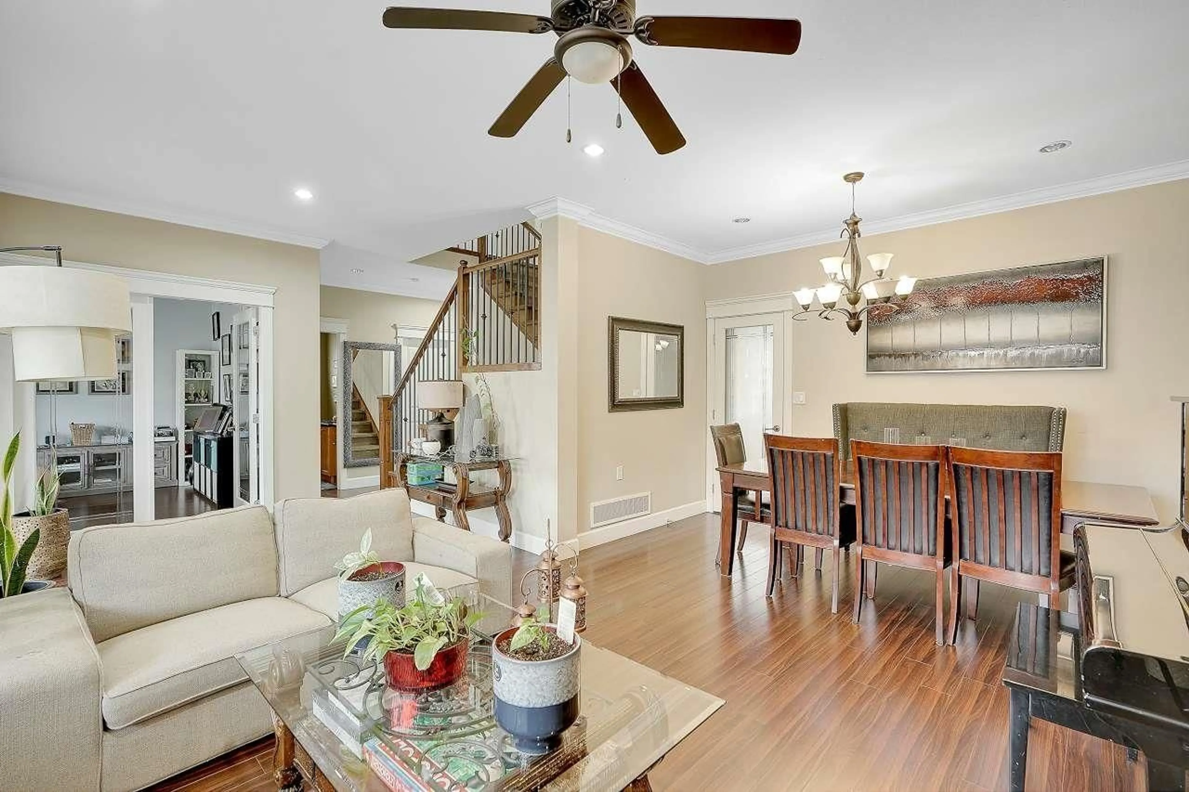 Living room with furniture, wood/laminate floor for 8378 208TH, Langley British Columbia V2Y0A7