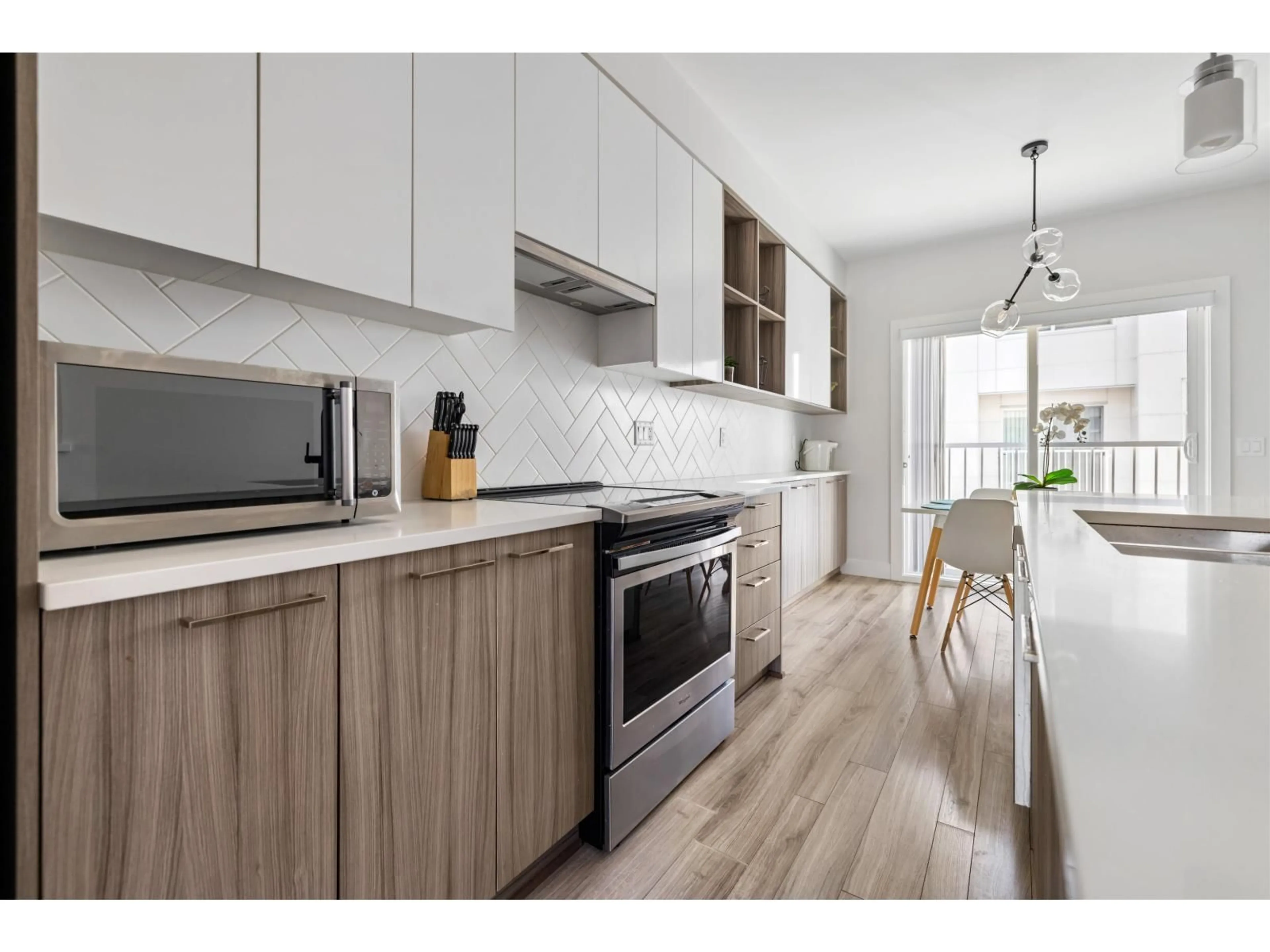 Open concept kitchen, wood/laminate floor for 28 - 2505 WARE, Abbotsford British Columbia V2S0K3