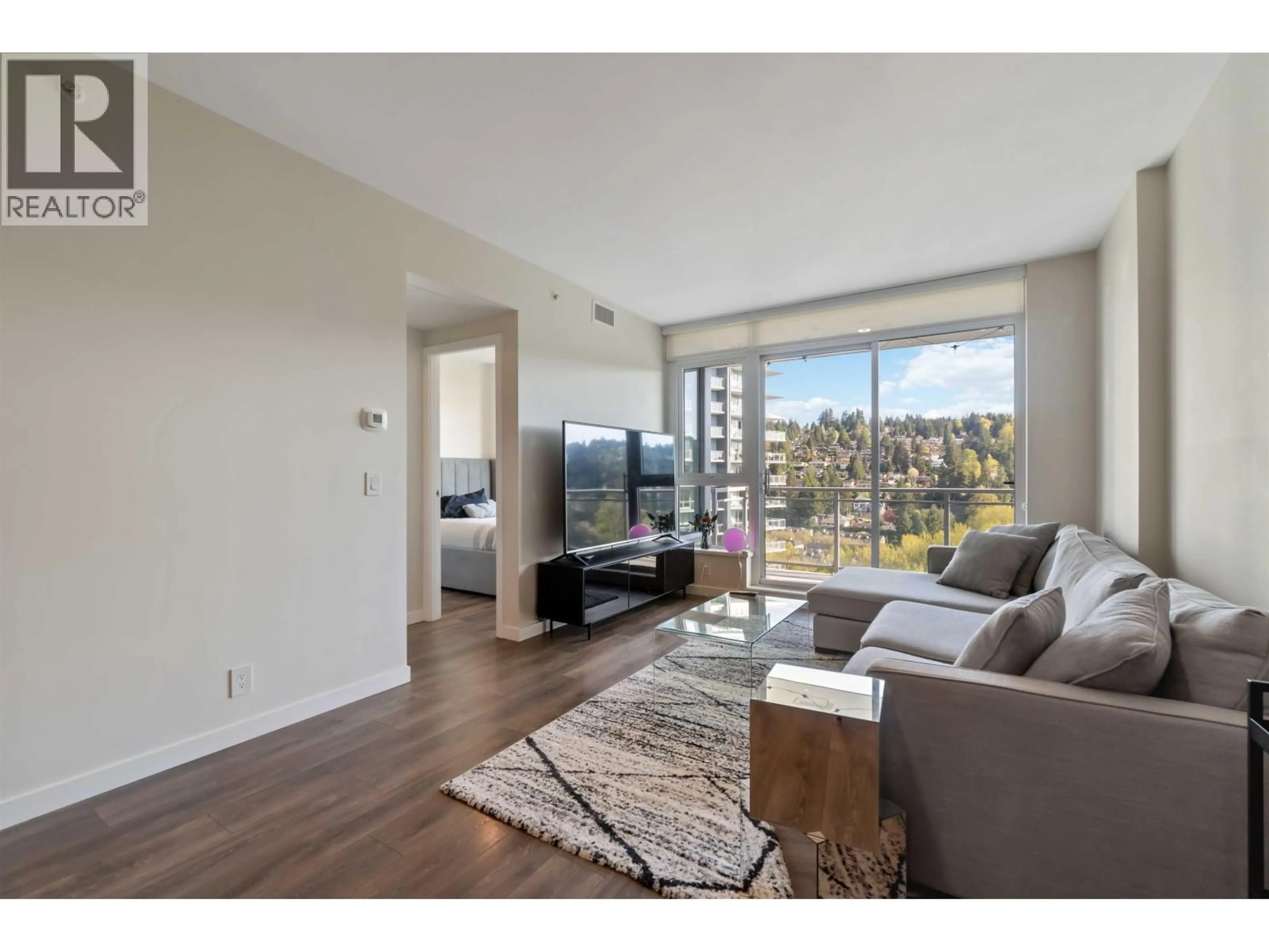 Living room with furniture, wood/laminate floor for 2005 - 305 MORRISSEY ROAD, Port Moody British Columbia V3H0M3
