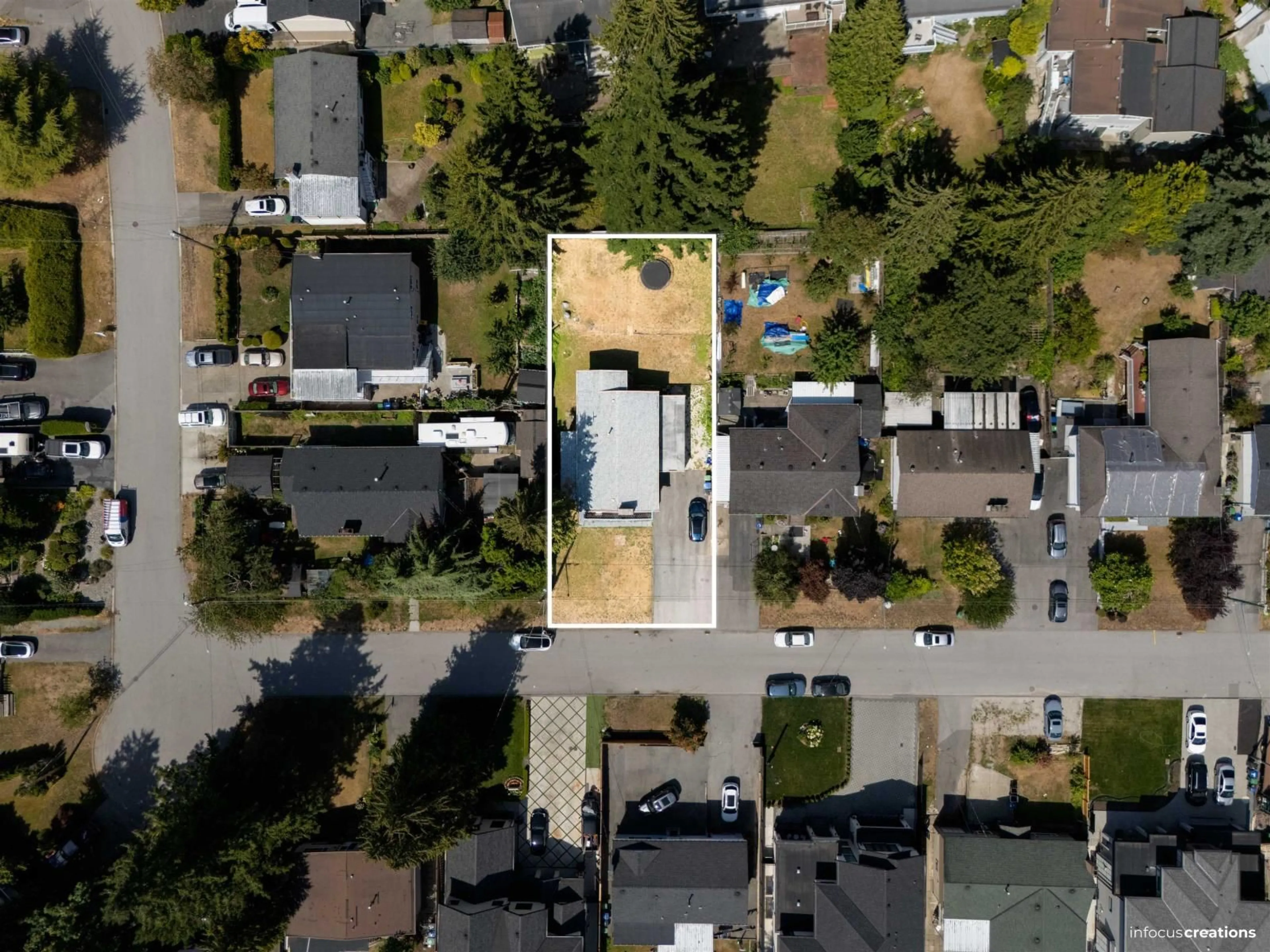 A pic from outside/outdoor area/front of a property/back of a property/a pic from drone, street for 13137 99, Surrey British Columbia V3T1G1