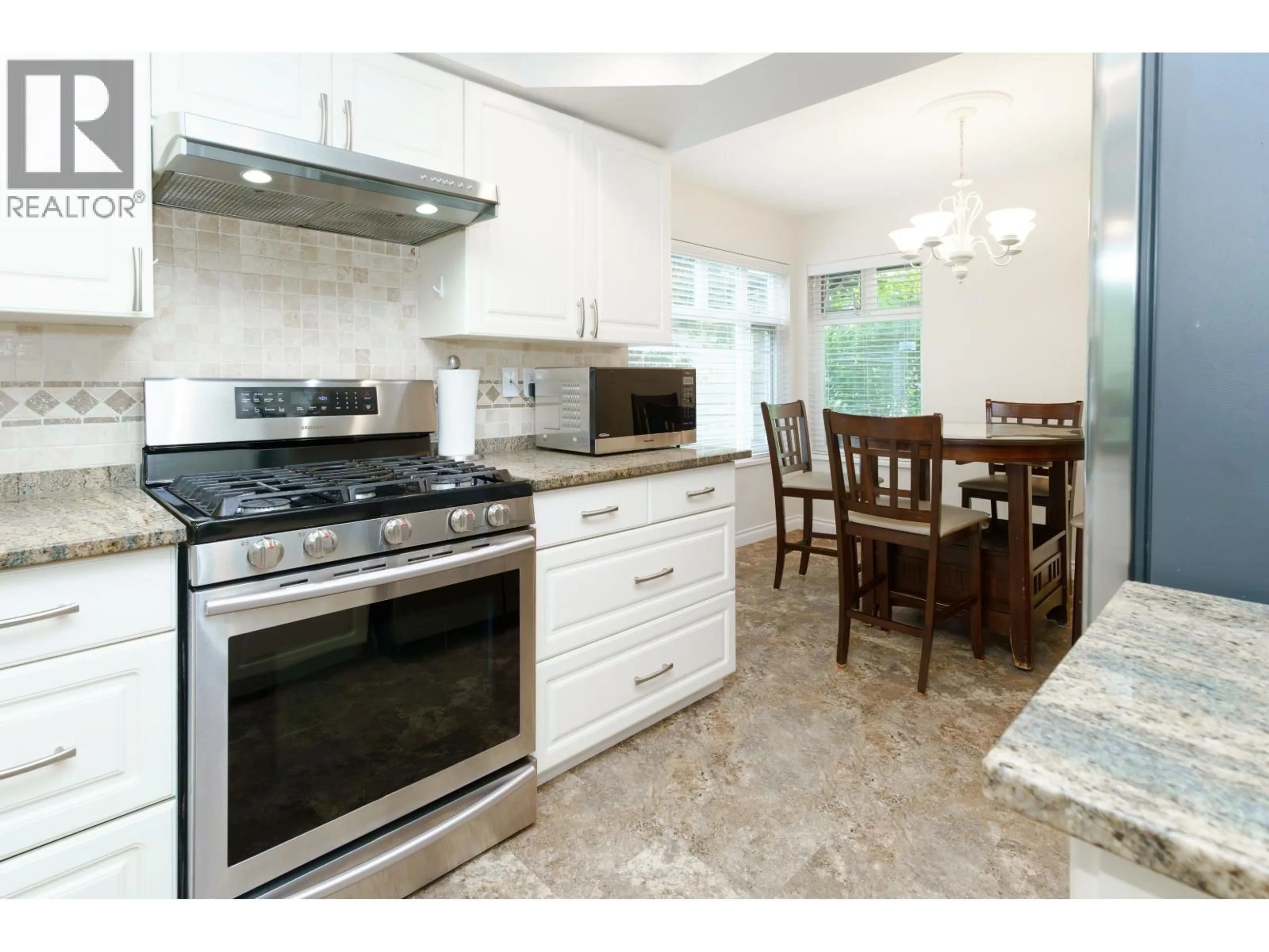 Open concept kitchen, ceramic/tile floor for 49 - 11737 236 STREET, Maple Ridge British Columbia V4R2E5