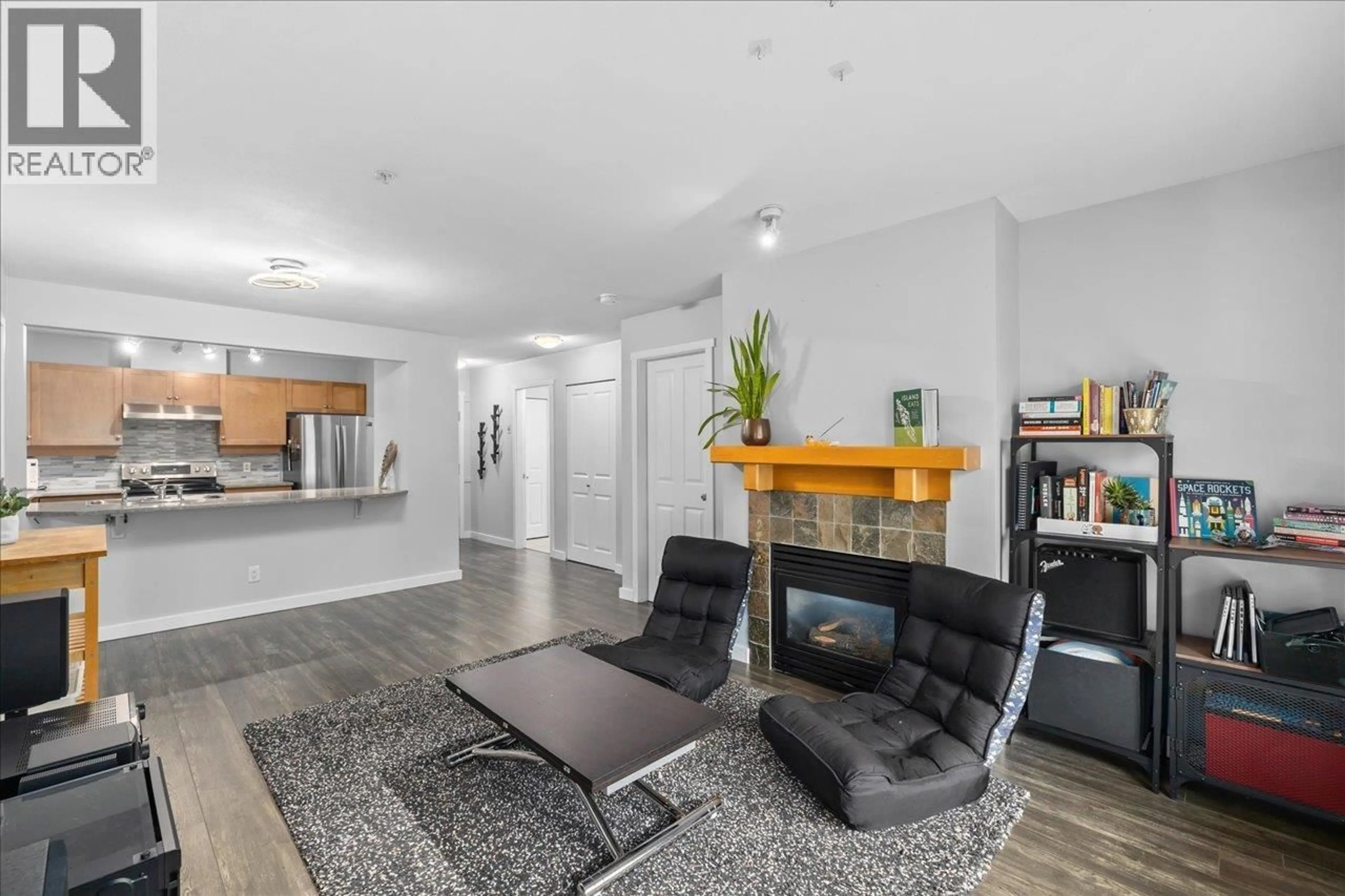 Living room with furniture, unknown for 207 - 15 SMOKEY SMITH PLACE, New Westminster British Columbia V3L5V7
